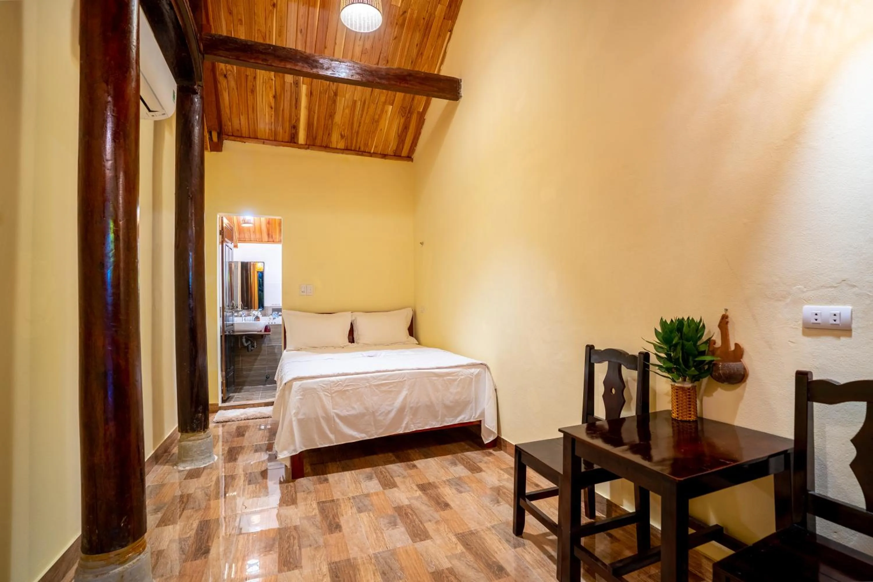 Photo of the whole room, Bed in Phong Nha Ecolodge Homestay & Tours - Mountain View