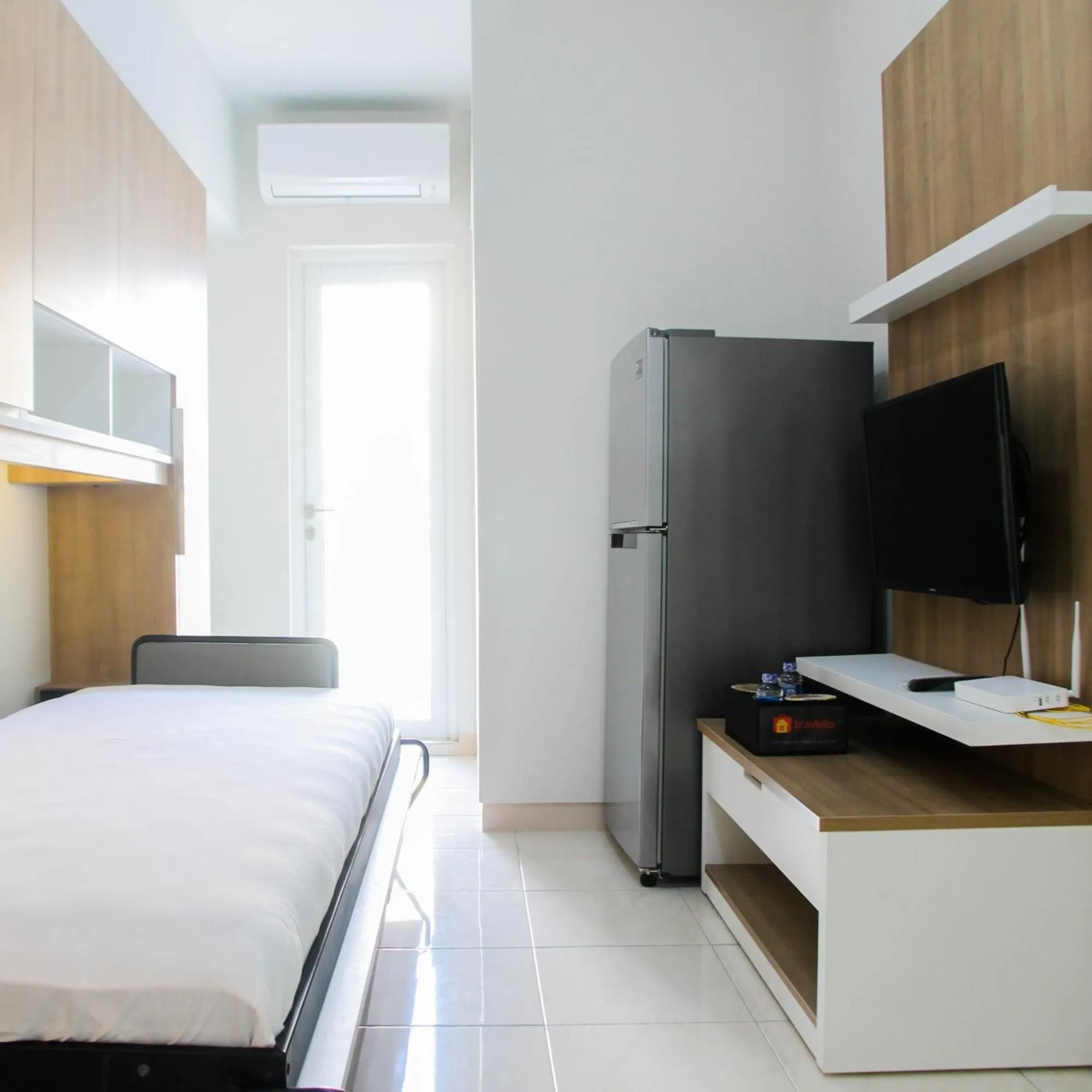 2BR with Sofa Bed at Springlake Summarecon Apartment By Travelio