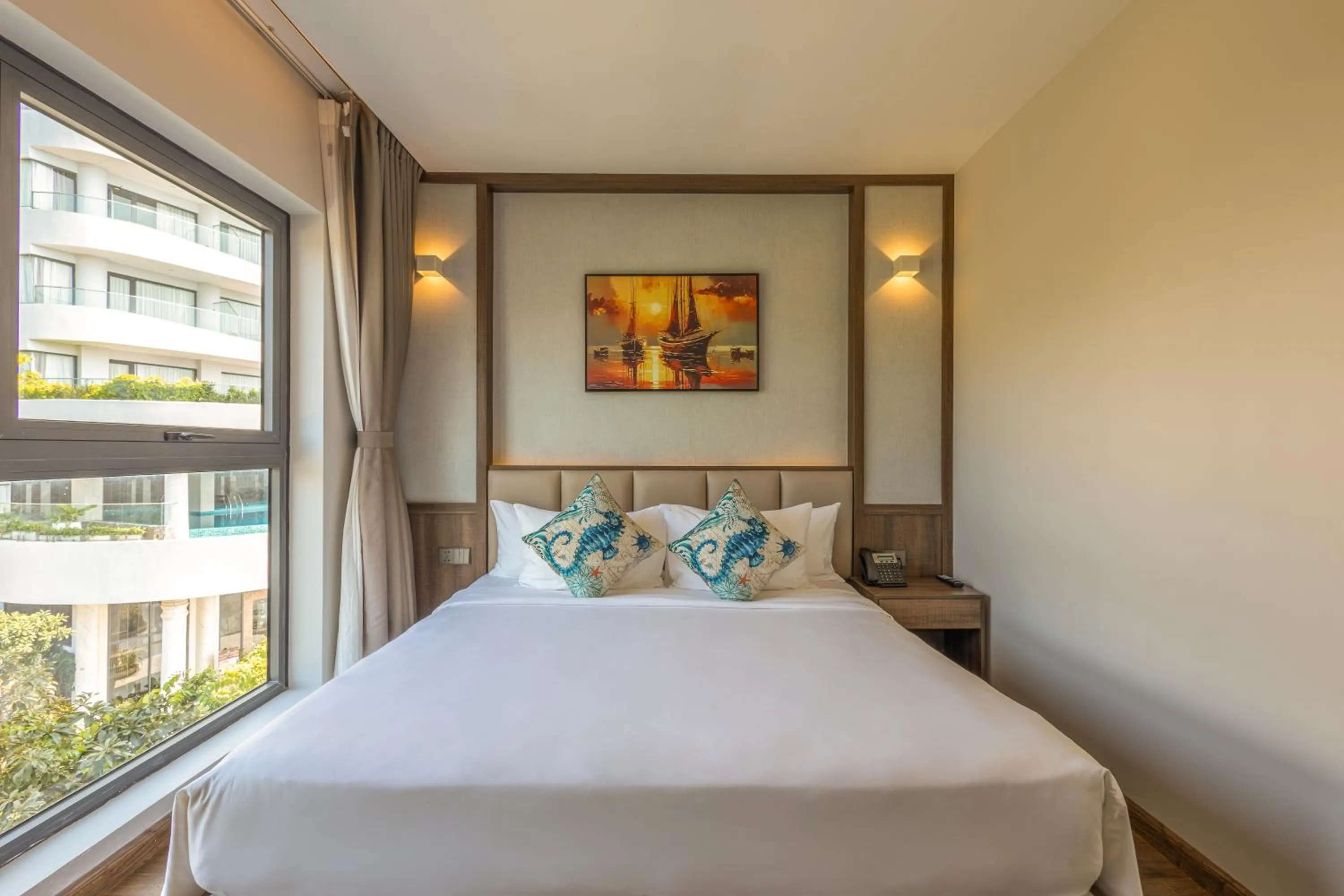 Bed in Sunset Beach Resort and Spa