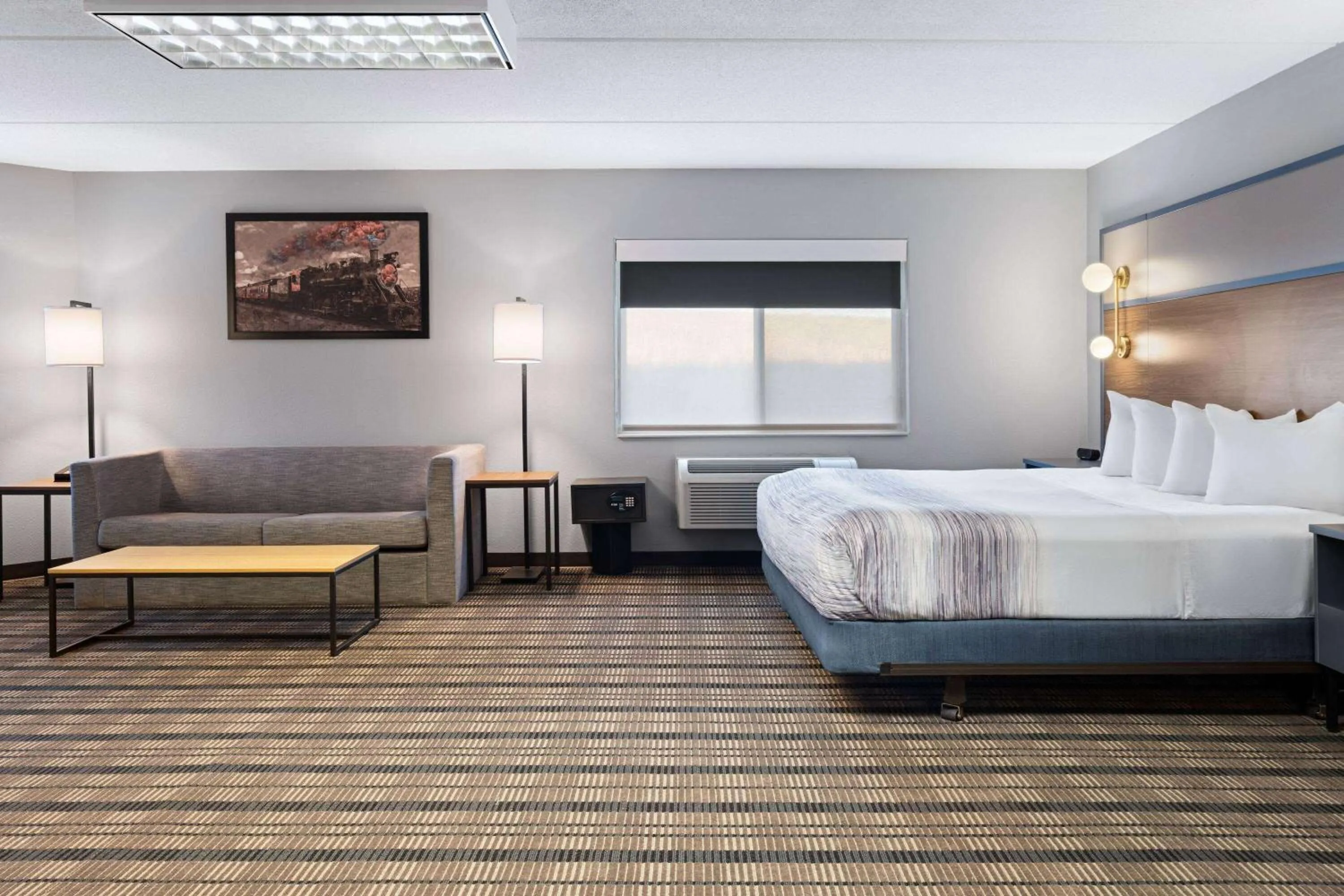 Photo of the whole room, Bed in AmericInn by Wyndham Beaver Dam