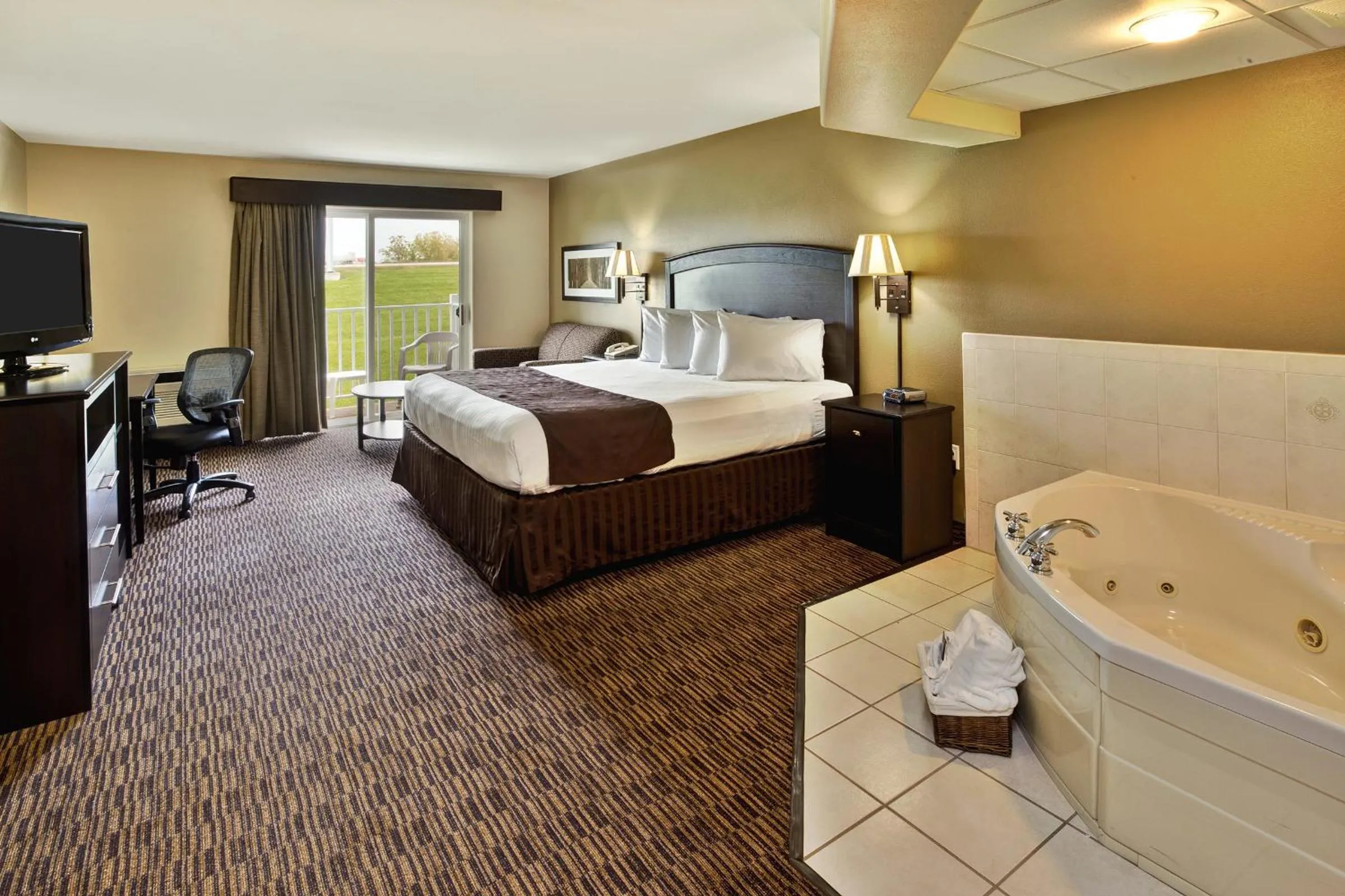 Photo of the whole room, Bed in AmericInn by Wyndham Beaver Dam