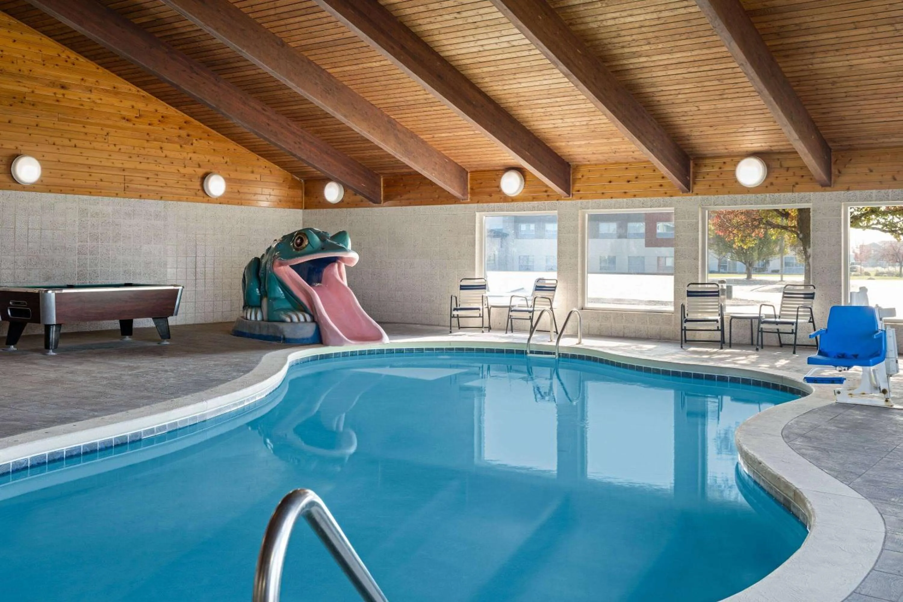 Swimming pool in AmericInn by Wyndham Beaver Dam