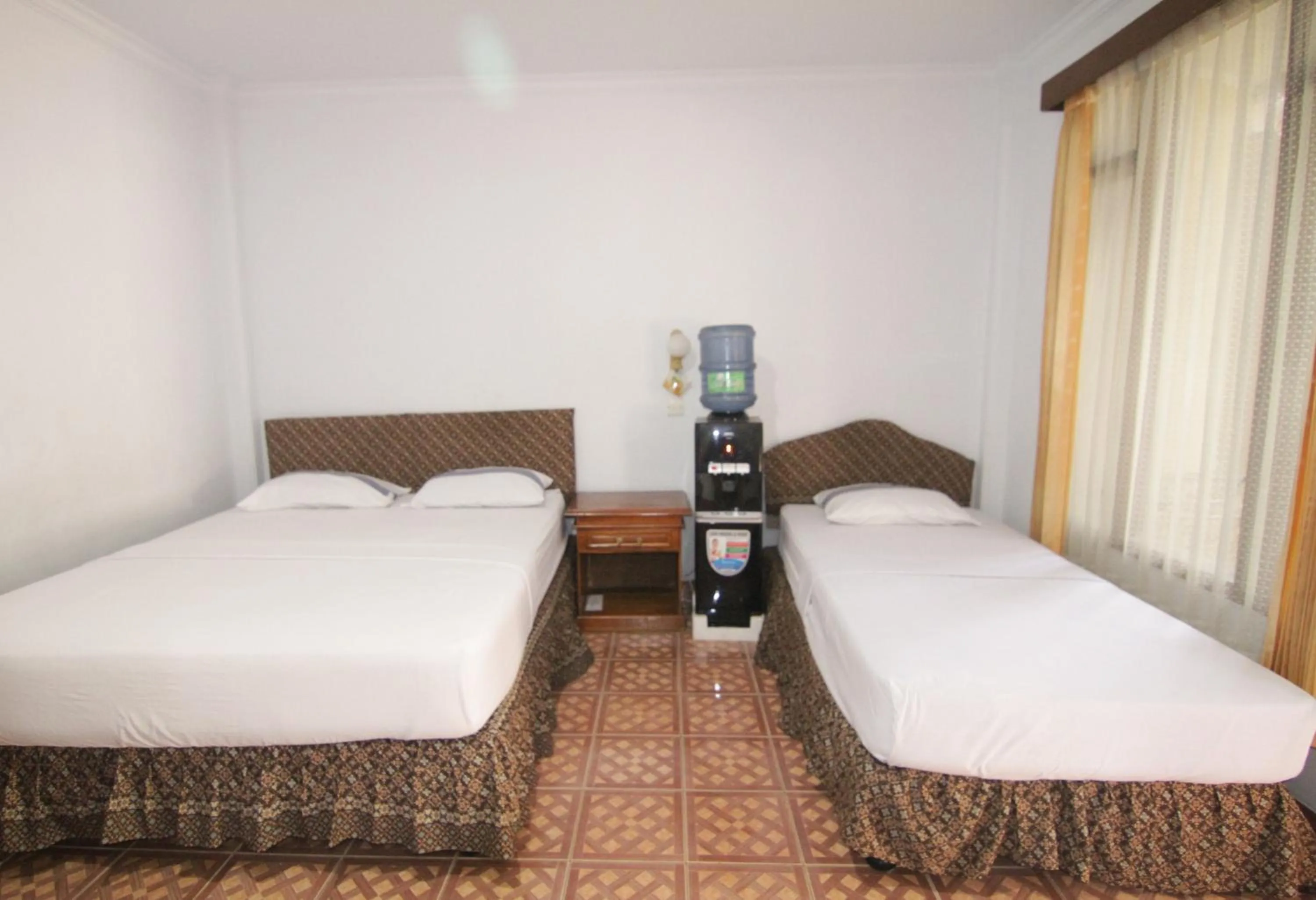 Bed in Grand Ciwareng Inn Hotel and Resort