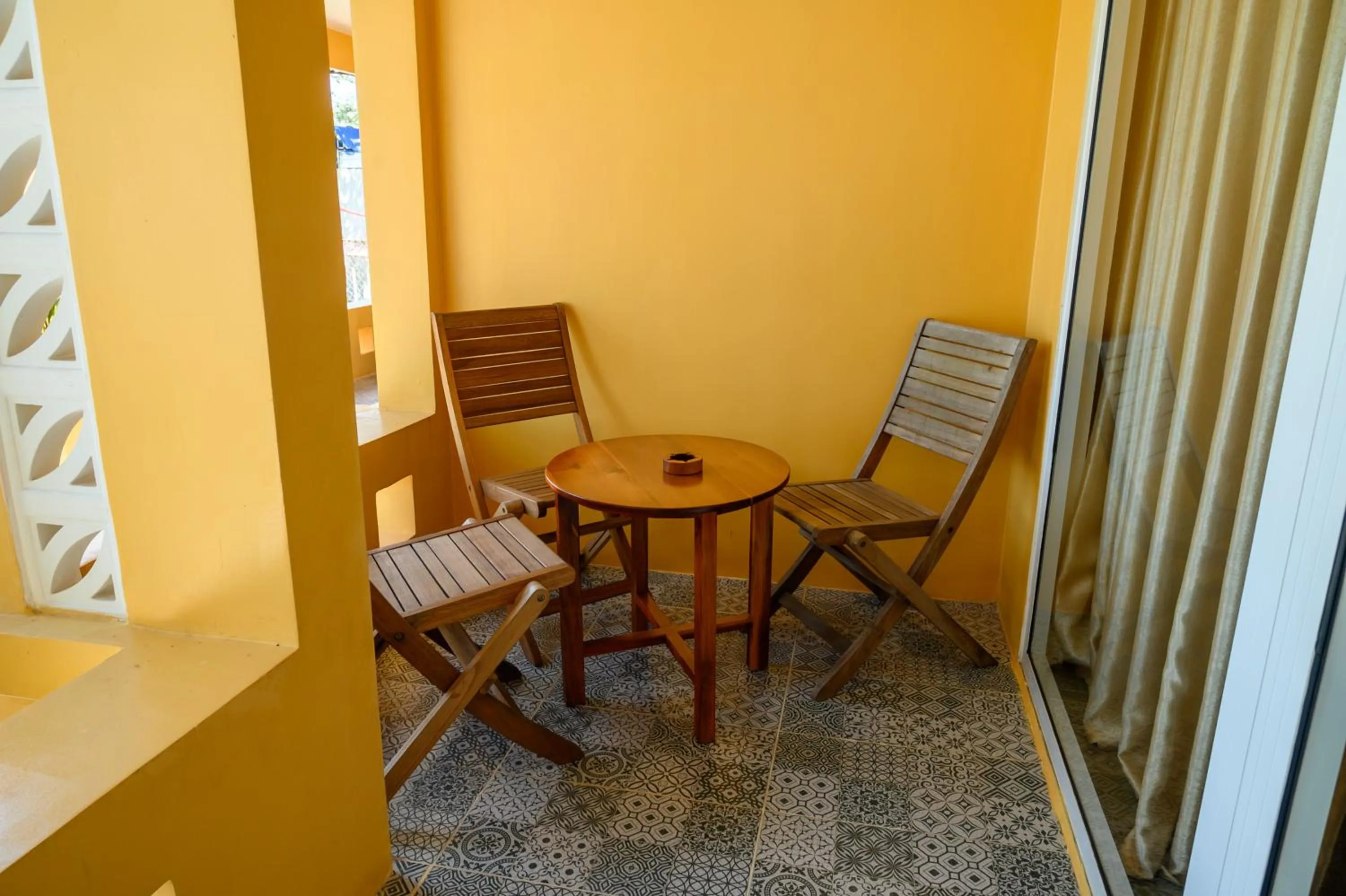 Seating area in Vida Loca Sunset Beach Resort