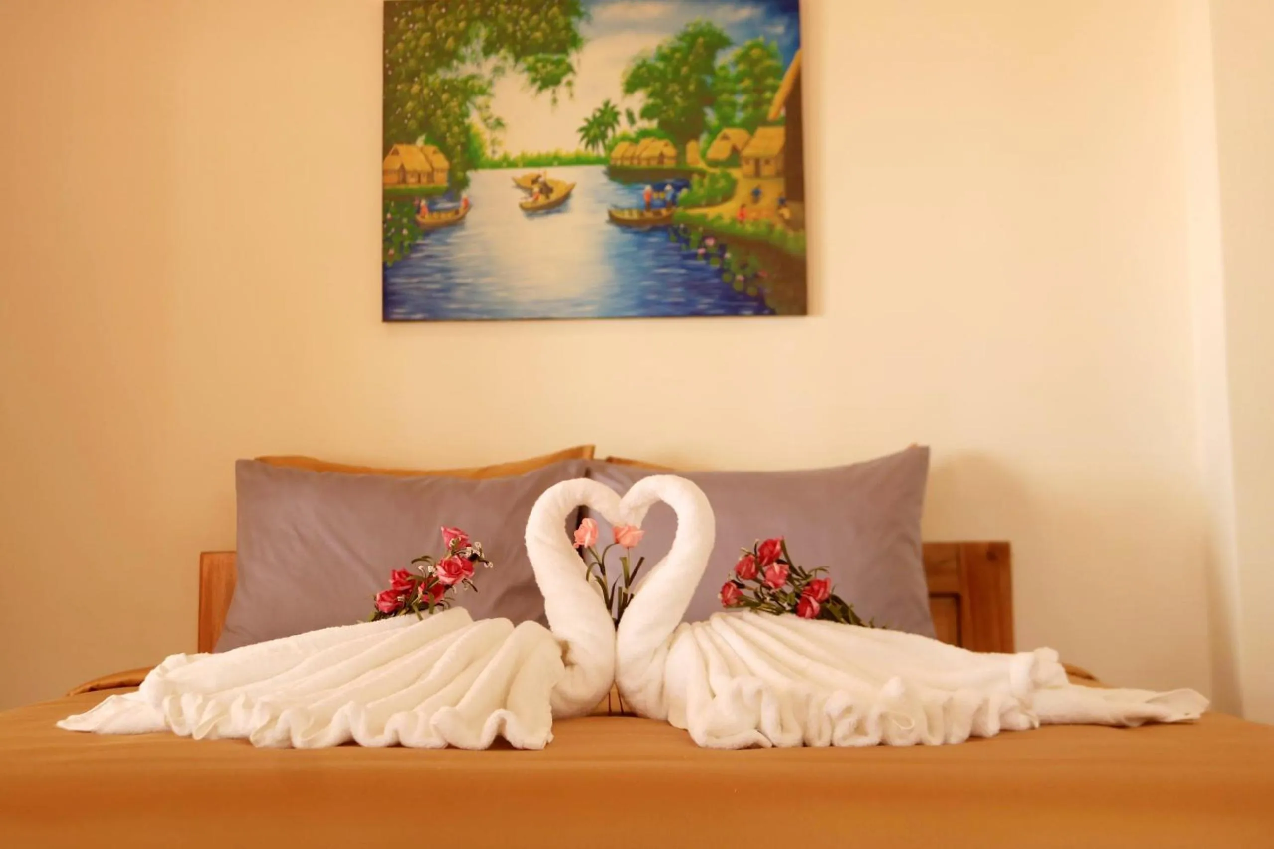 Bed in Vida Loca Sunset Beach Resort