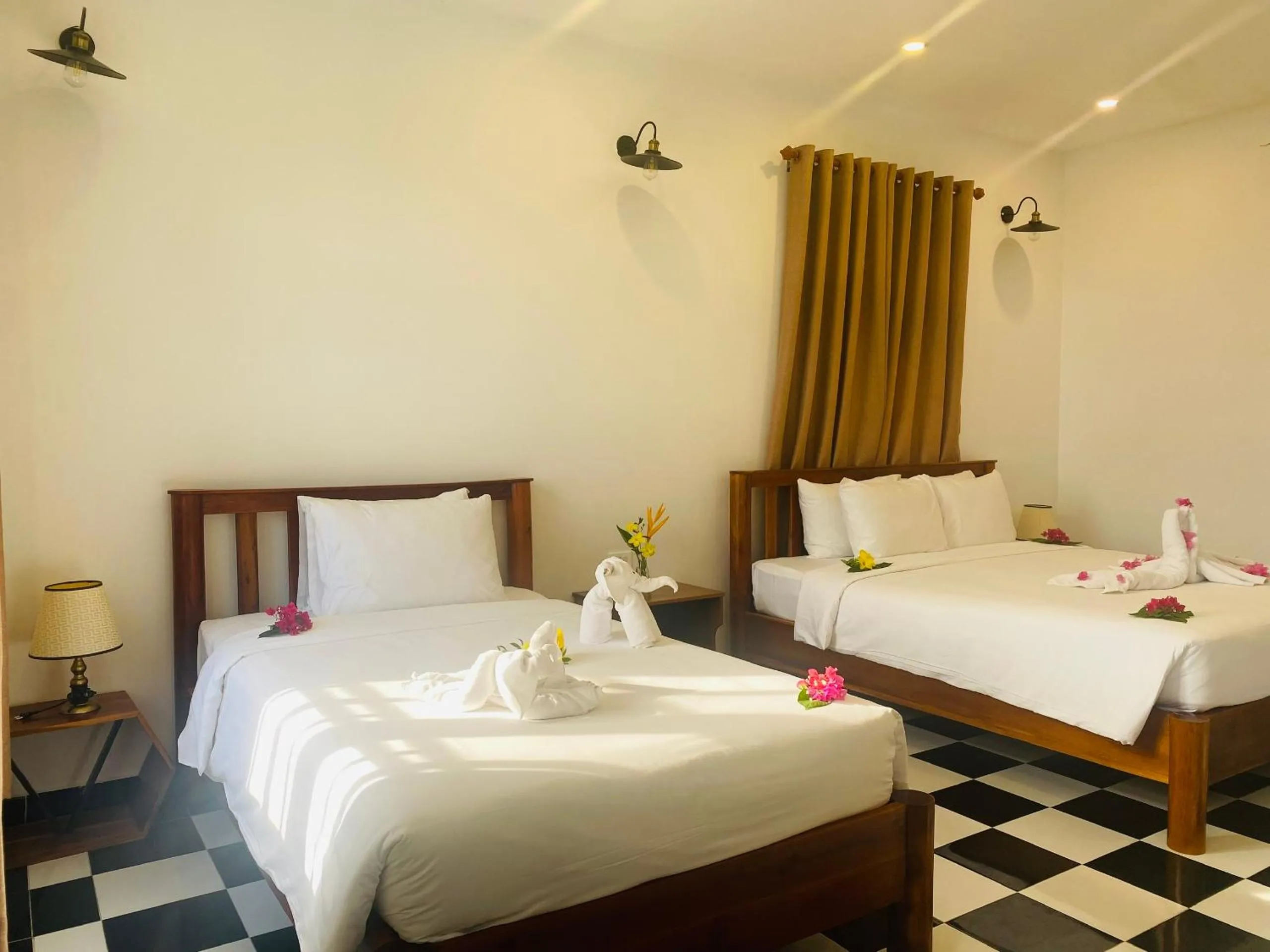 Bed in Vida Loca Sunset Beach Resort