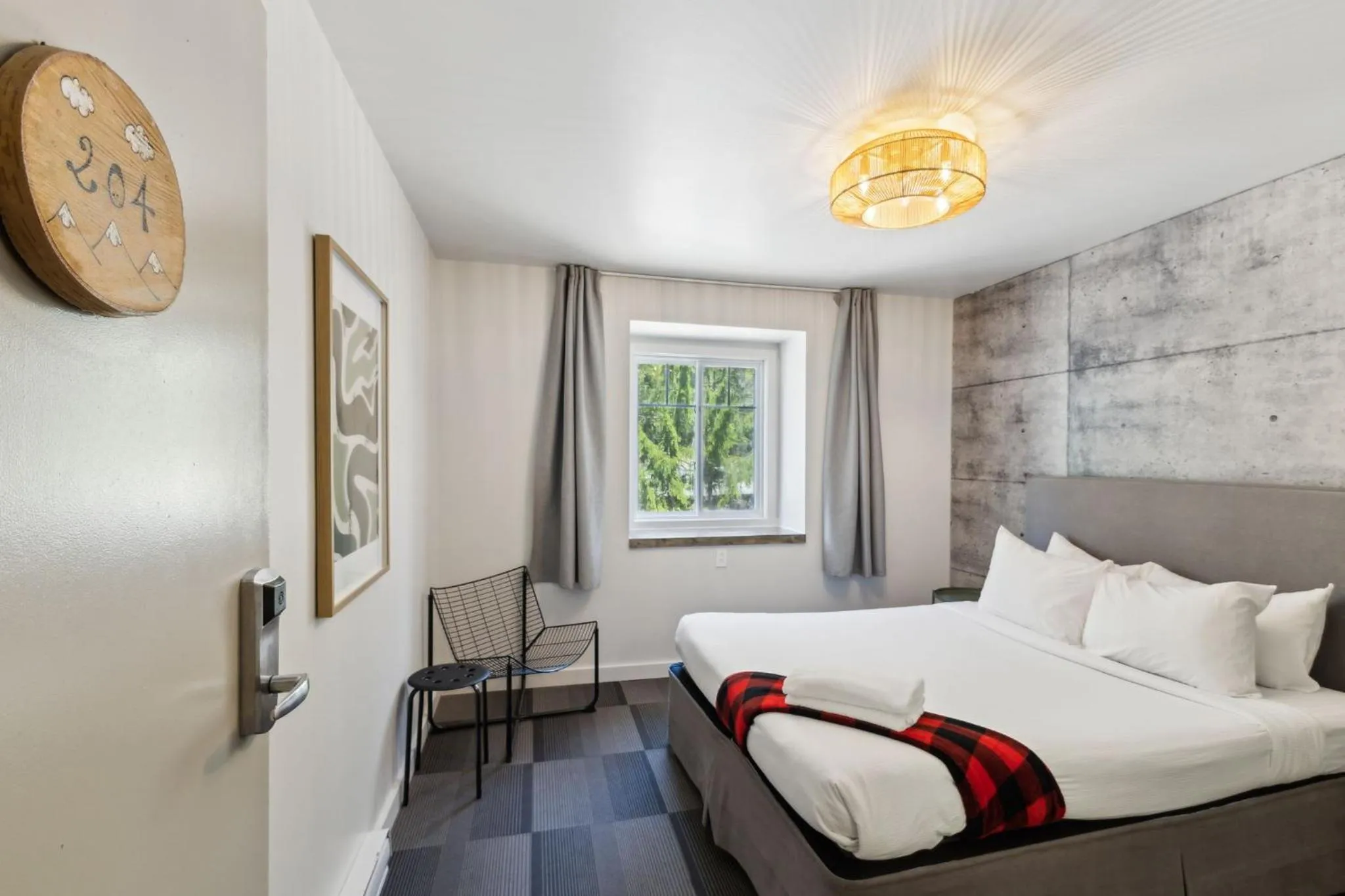 Bed in Auberge Manitonga