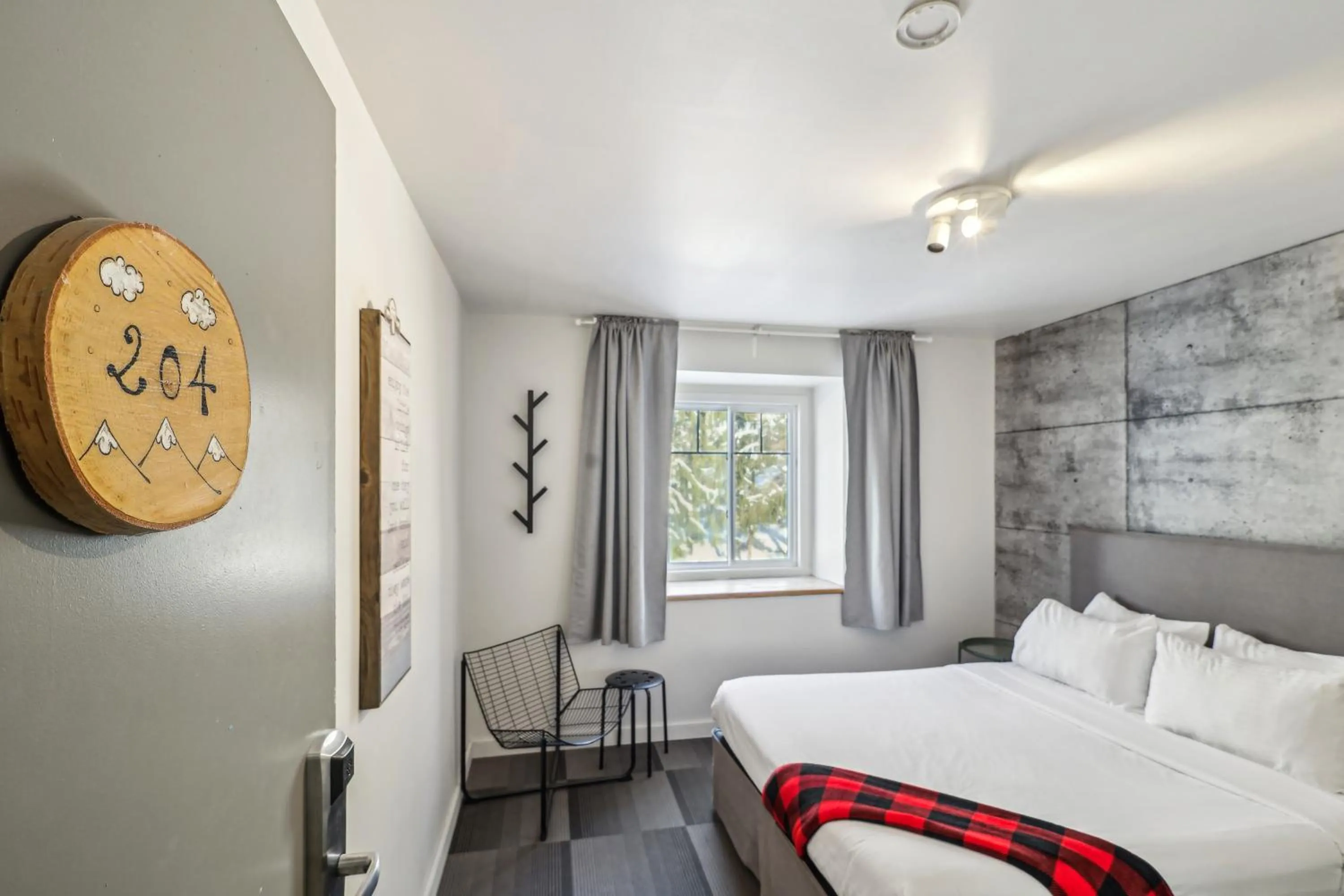 Bed in Auberge Manitonga