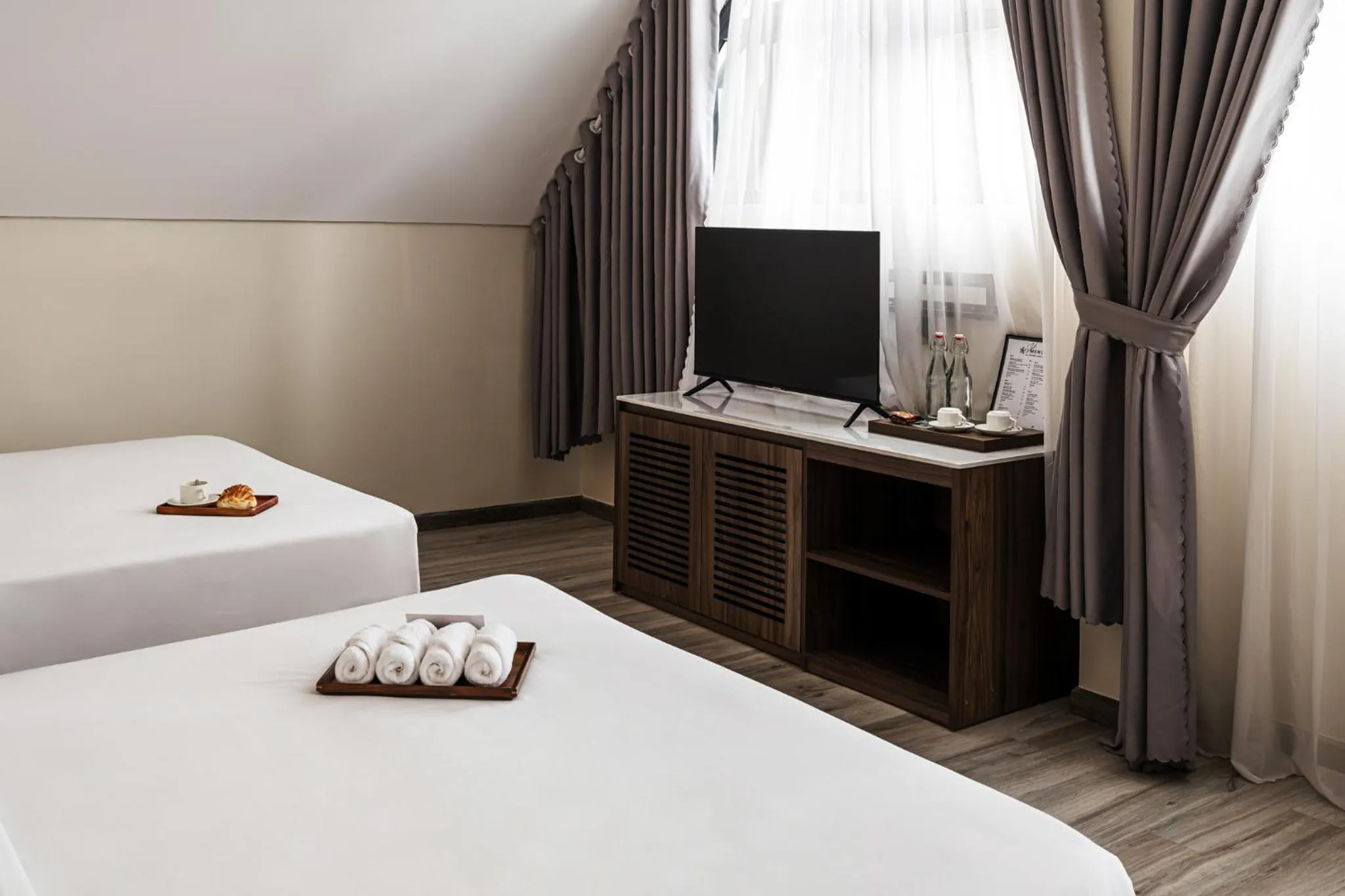 TV and multimedia, Bed in Canary Dalat Hotel