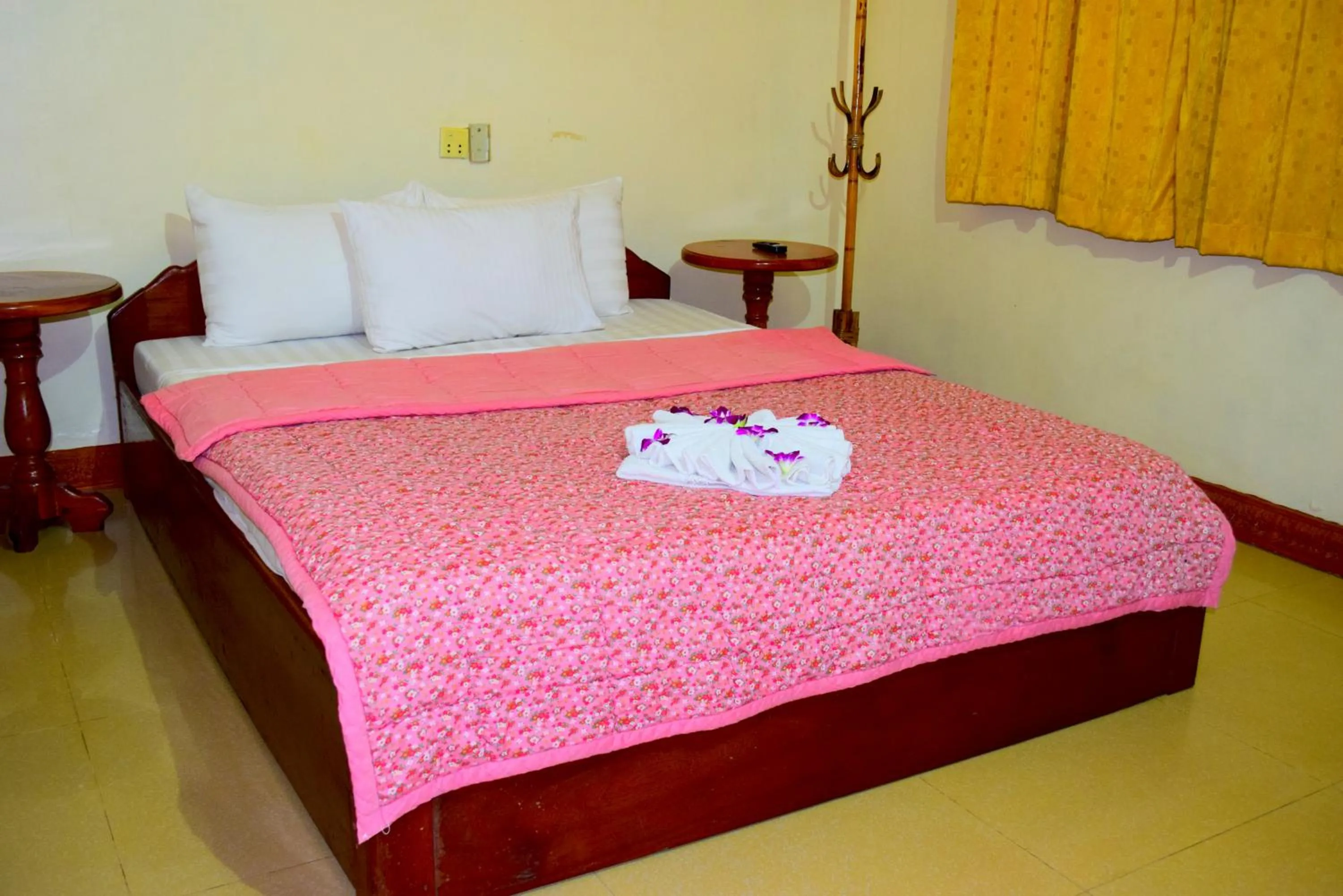 Photo of the whole room, Bed in Okay Guesthouse Siem Reap