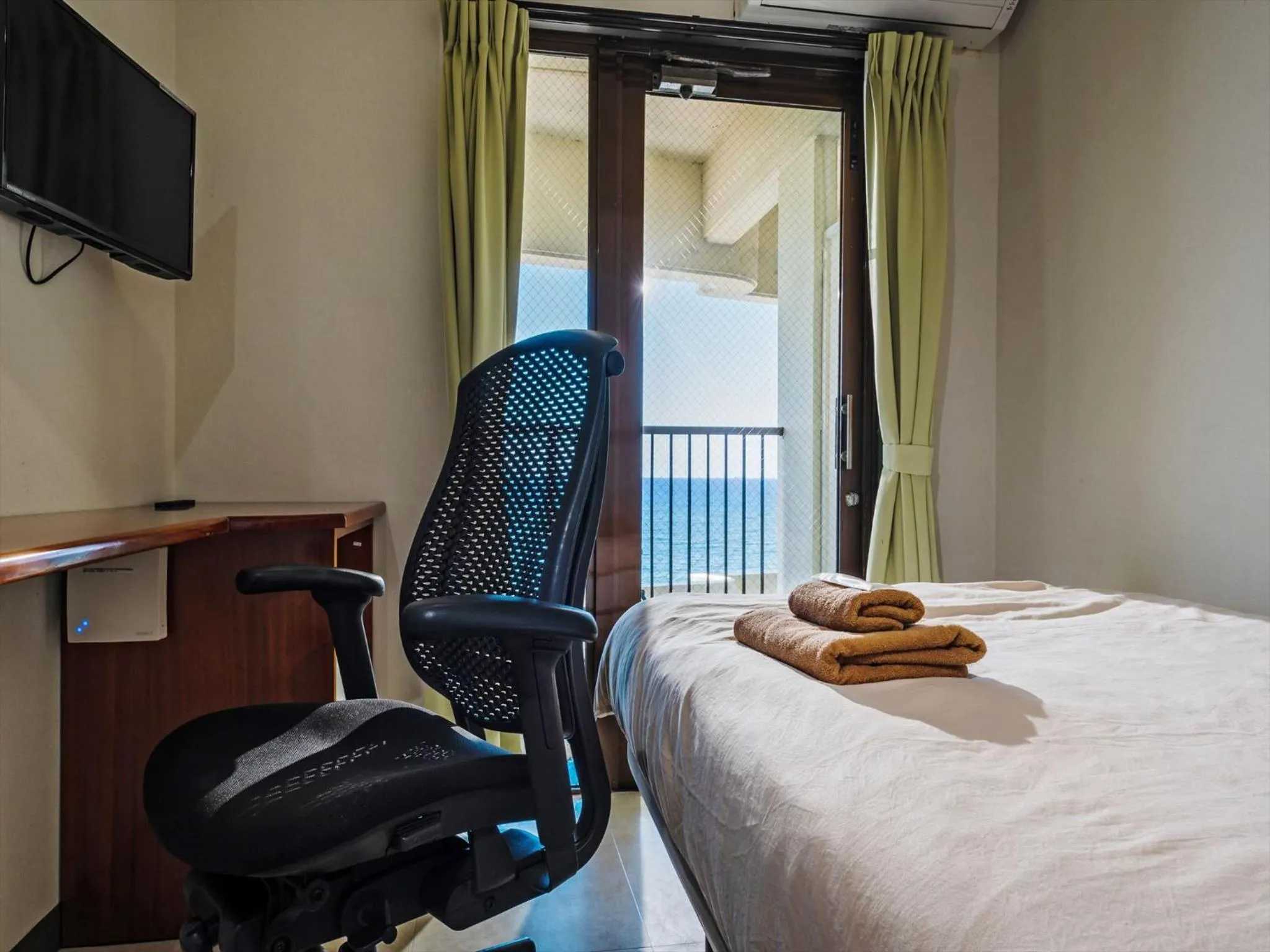 Bed in Hotel Sunset American