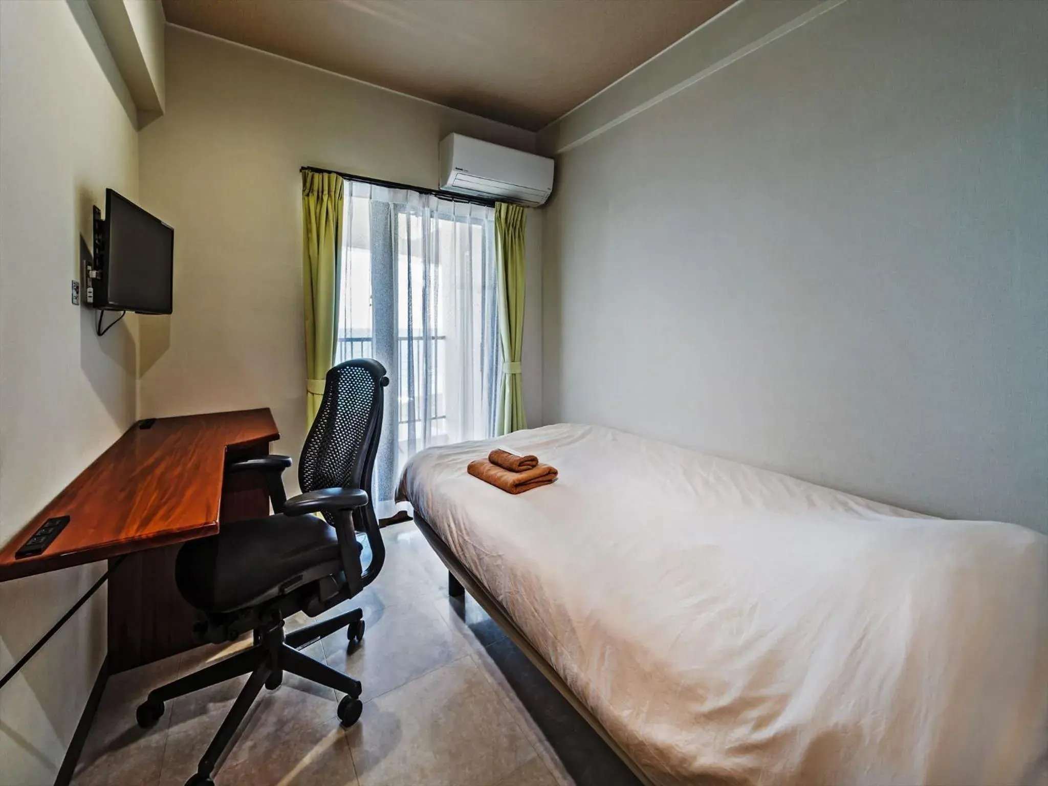 Communal lounge/ TV room, Bed in Hotel Sunset American Communal lounge/ TV room, Bed in Hotel Sunset American