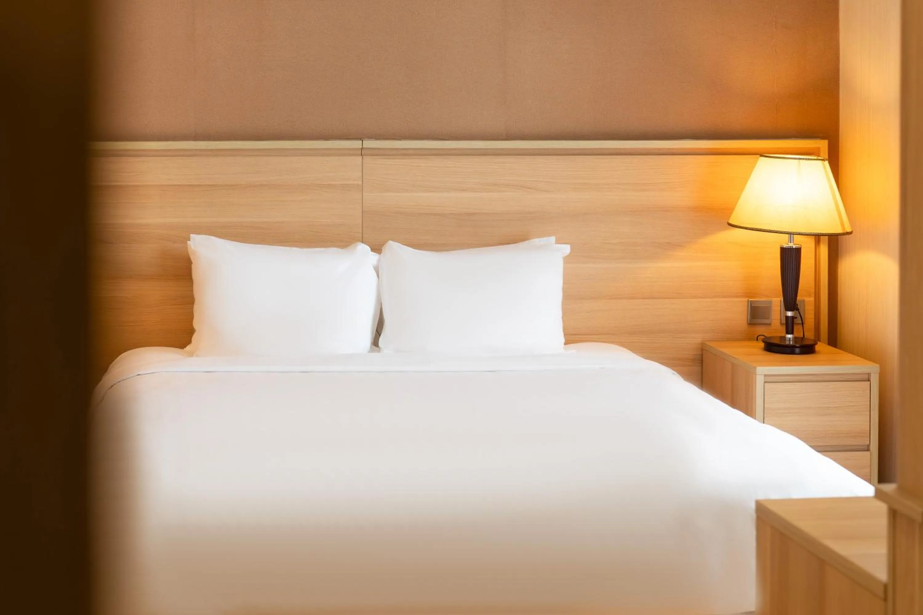 Bed in Super Candle Hotel