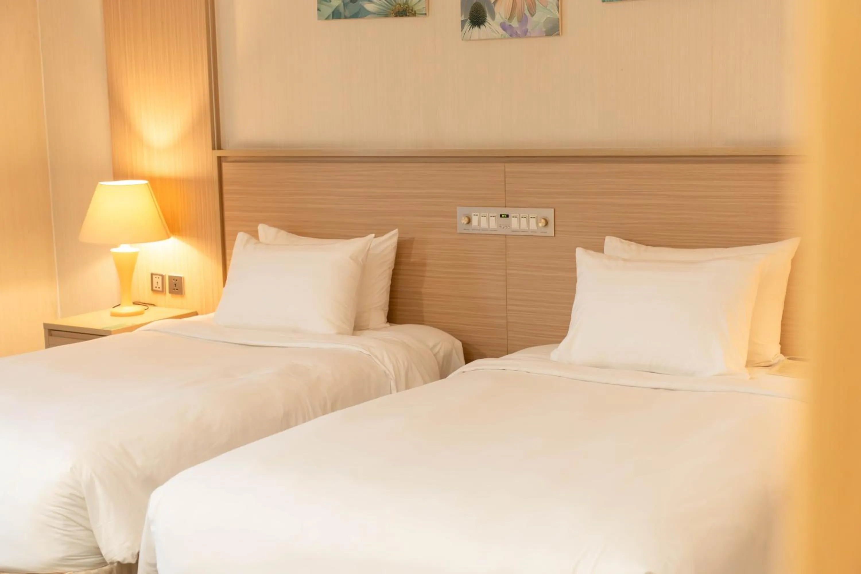 Bed in Super Candle Hotel