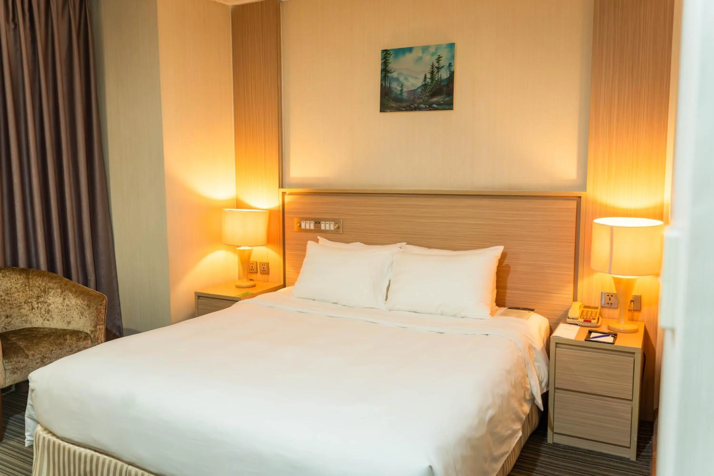 Bed in Super Candle Hotel