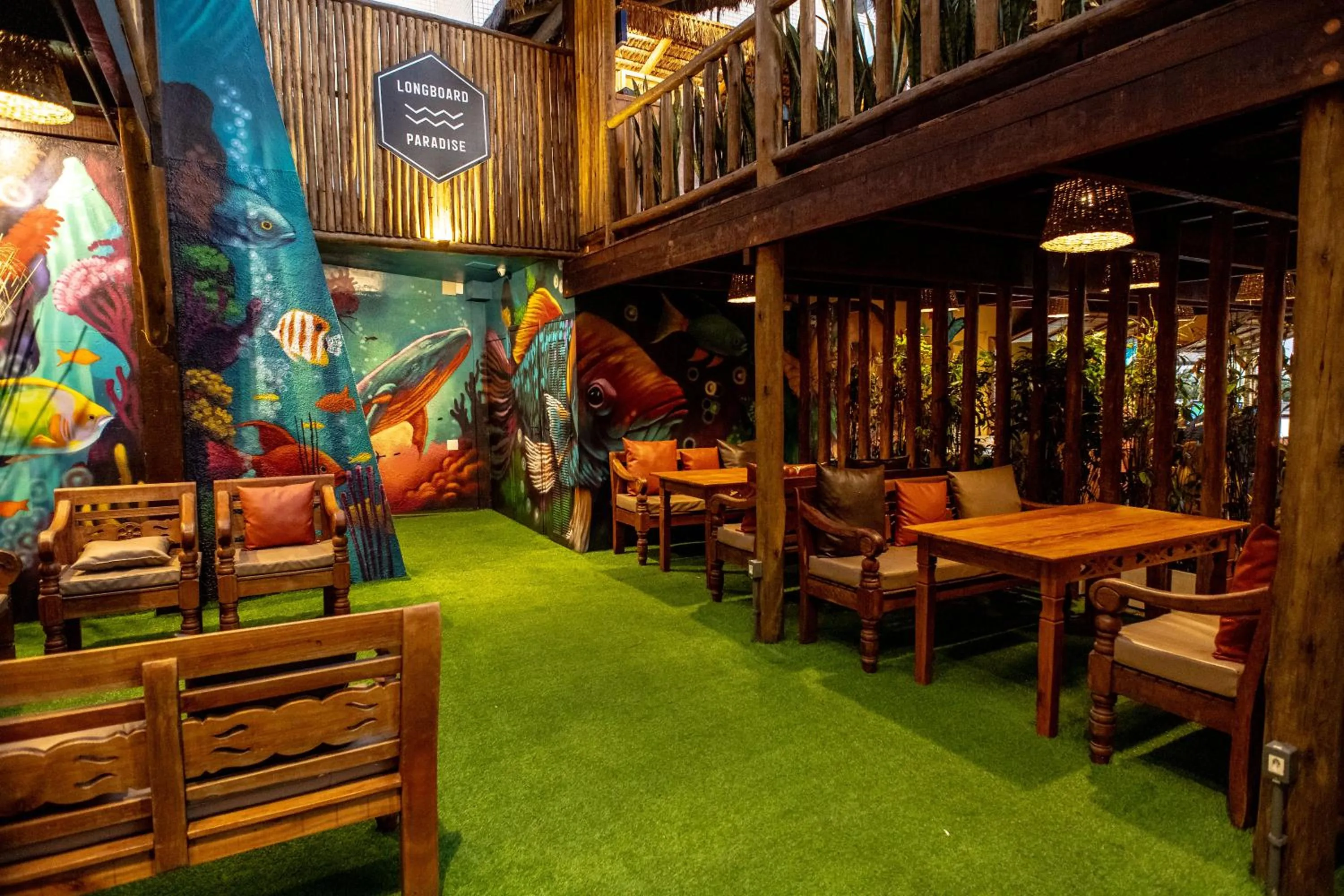 Seating area in Longboard Paradise Suítes