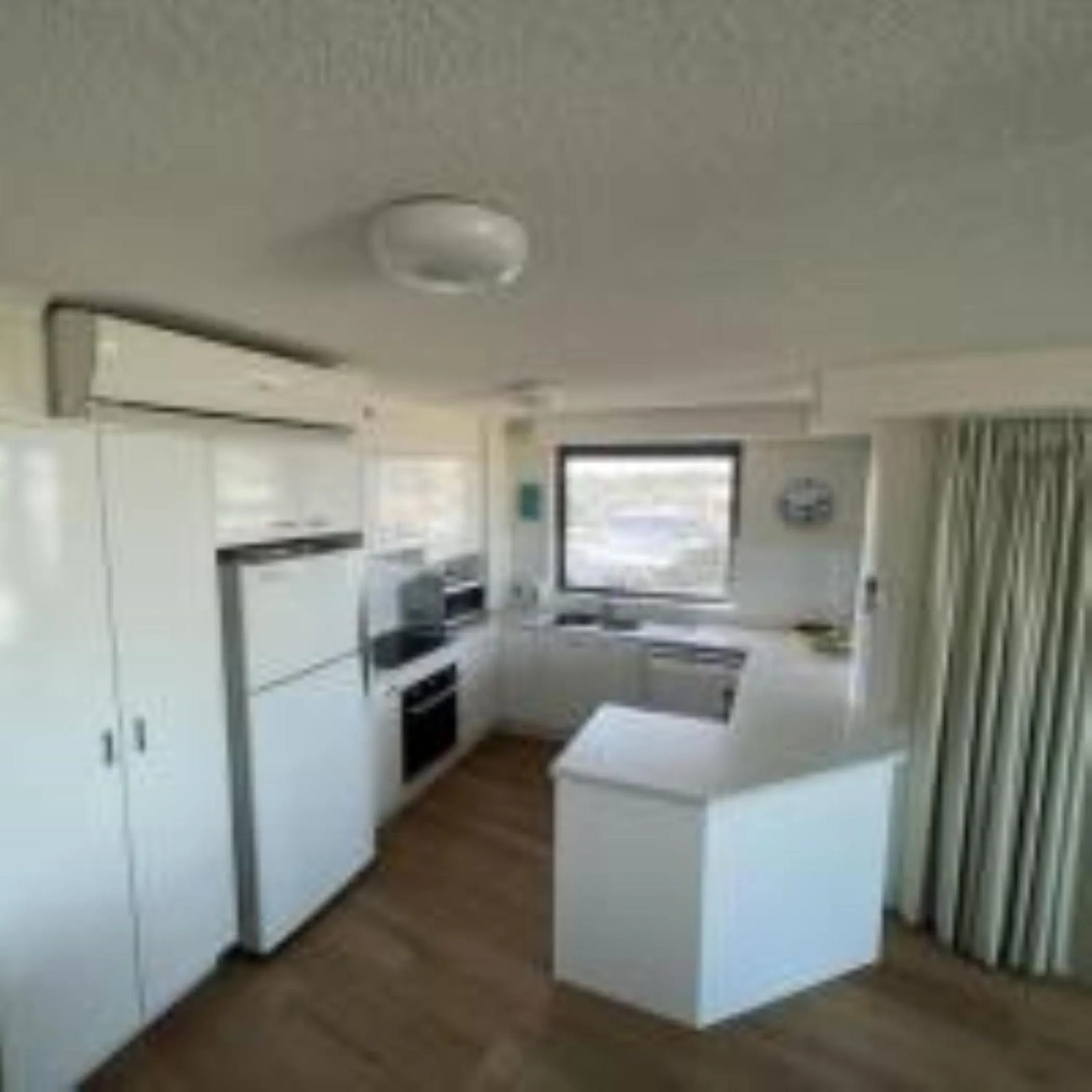 kitchen in Centrepoint Apartments Caloundra