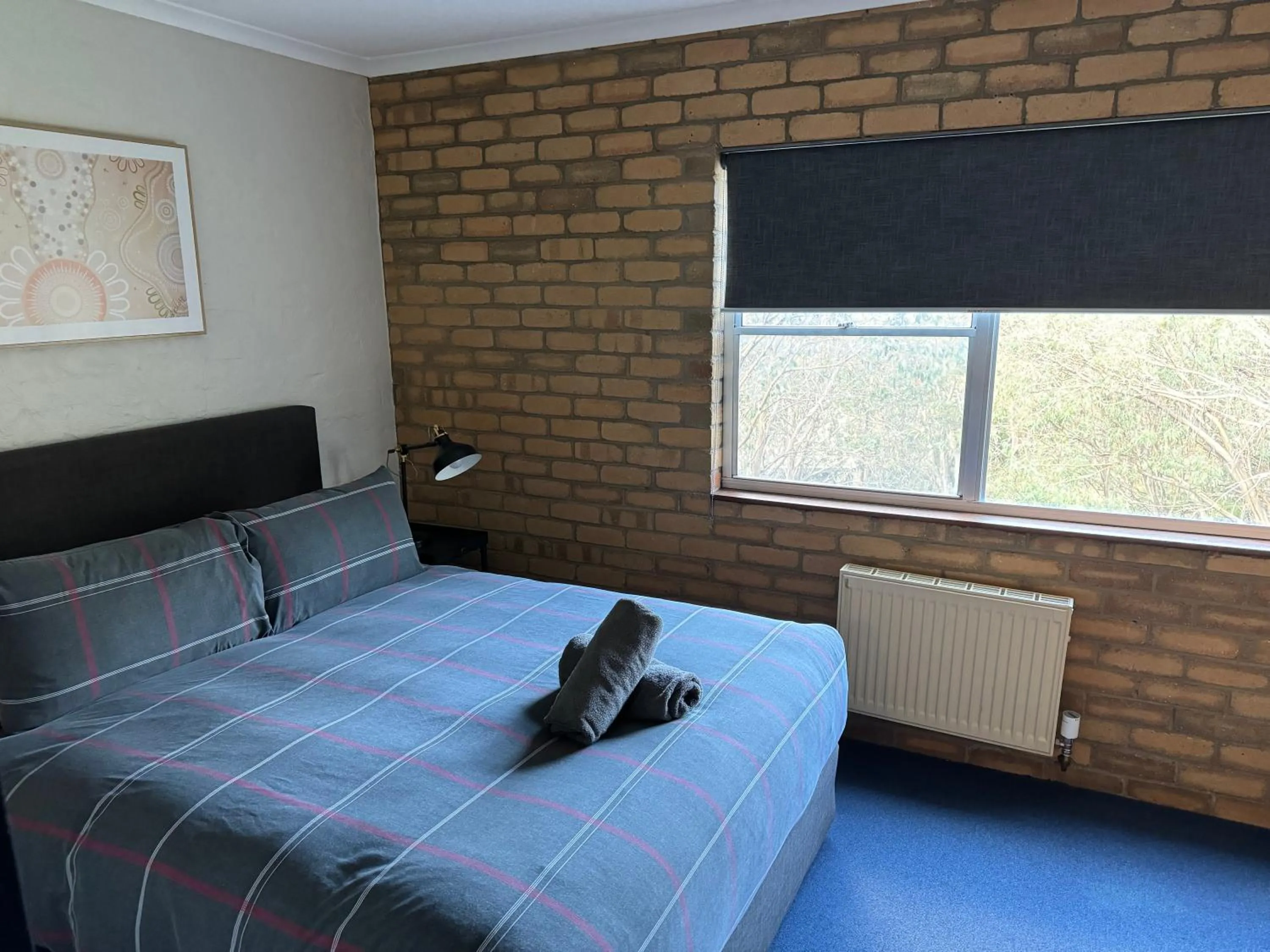 Bedroom, Bed in Attunga Alpine Lodge & Apartments