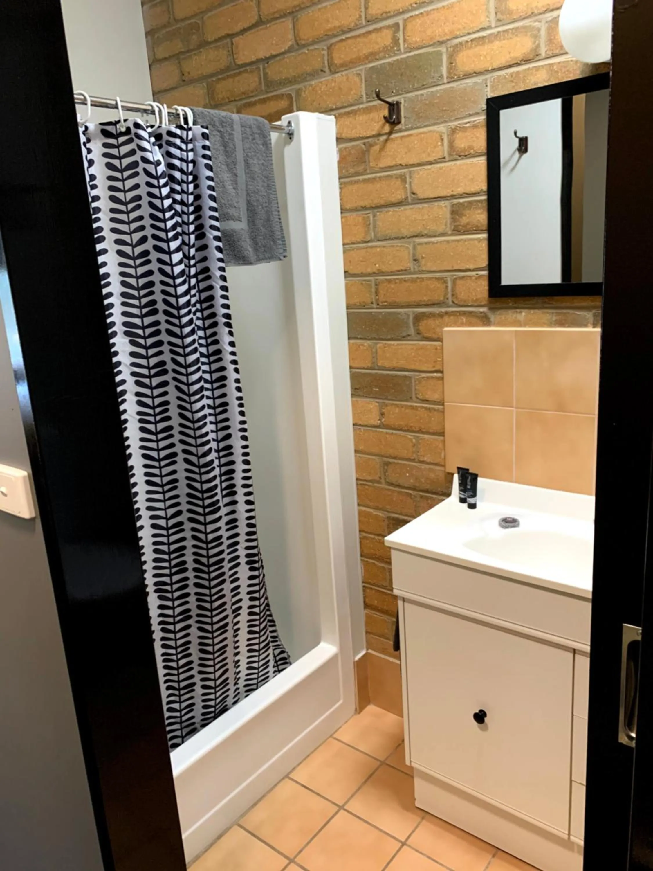 Shower in Attunga Alpine Lodge & Apartments