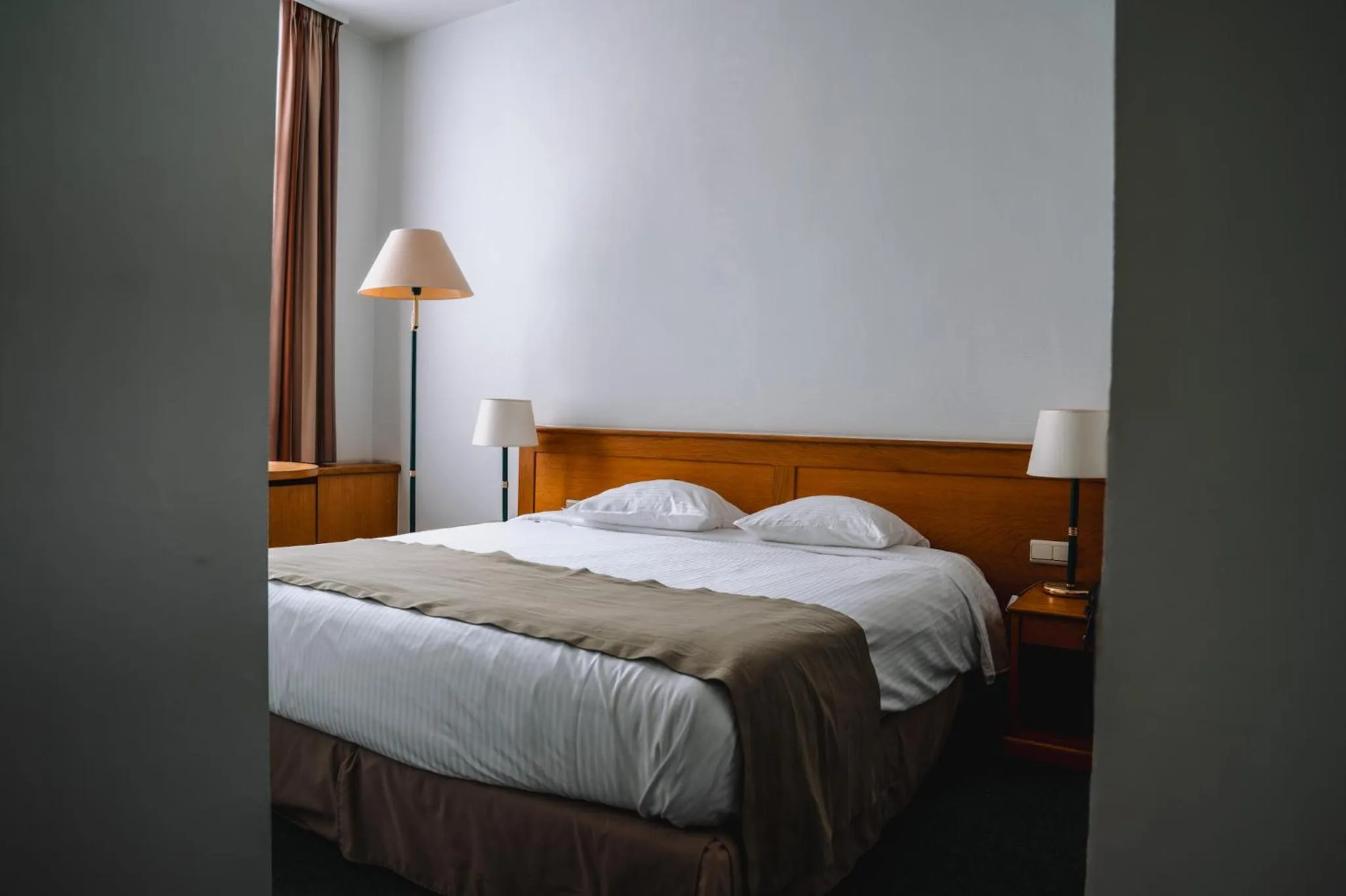 Bed in Hotel Les Eleveurs