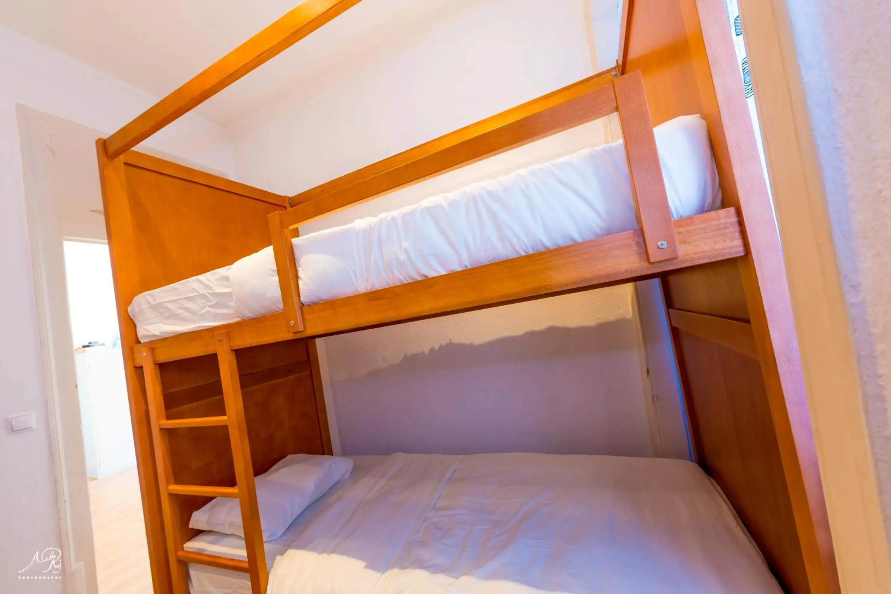 Bunk Bed in Mixed Dormitory Room in SwissLisbon Guest House Bunk Bed in Mixed Dormitory Room in SwissLisbon Guest House
