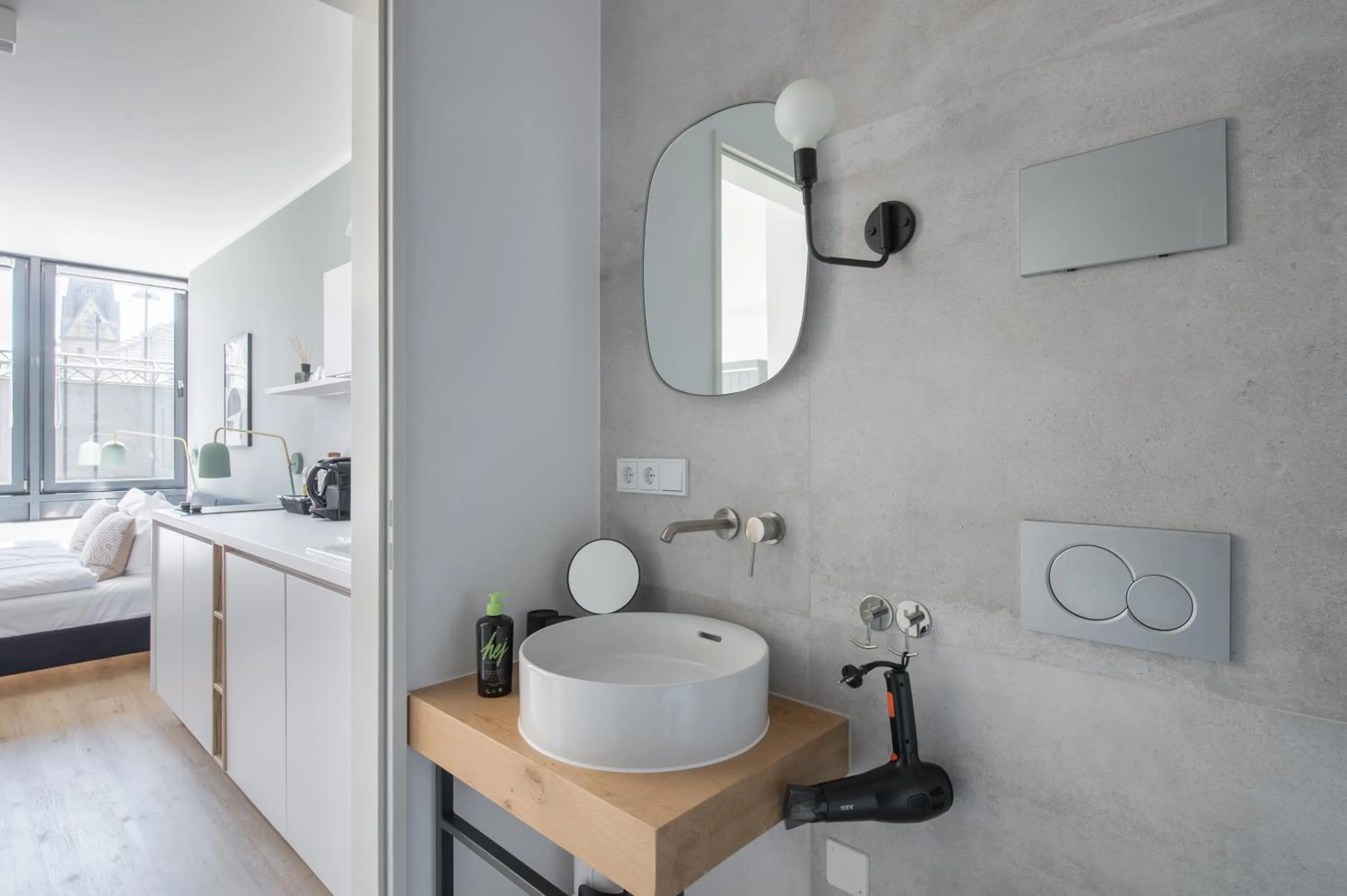 Bathroom, Bed in Limehome Flensburg Holm