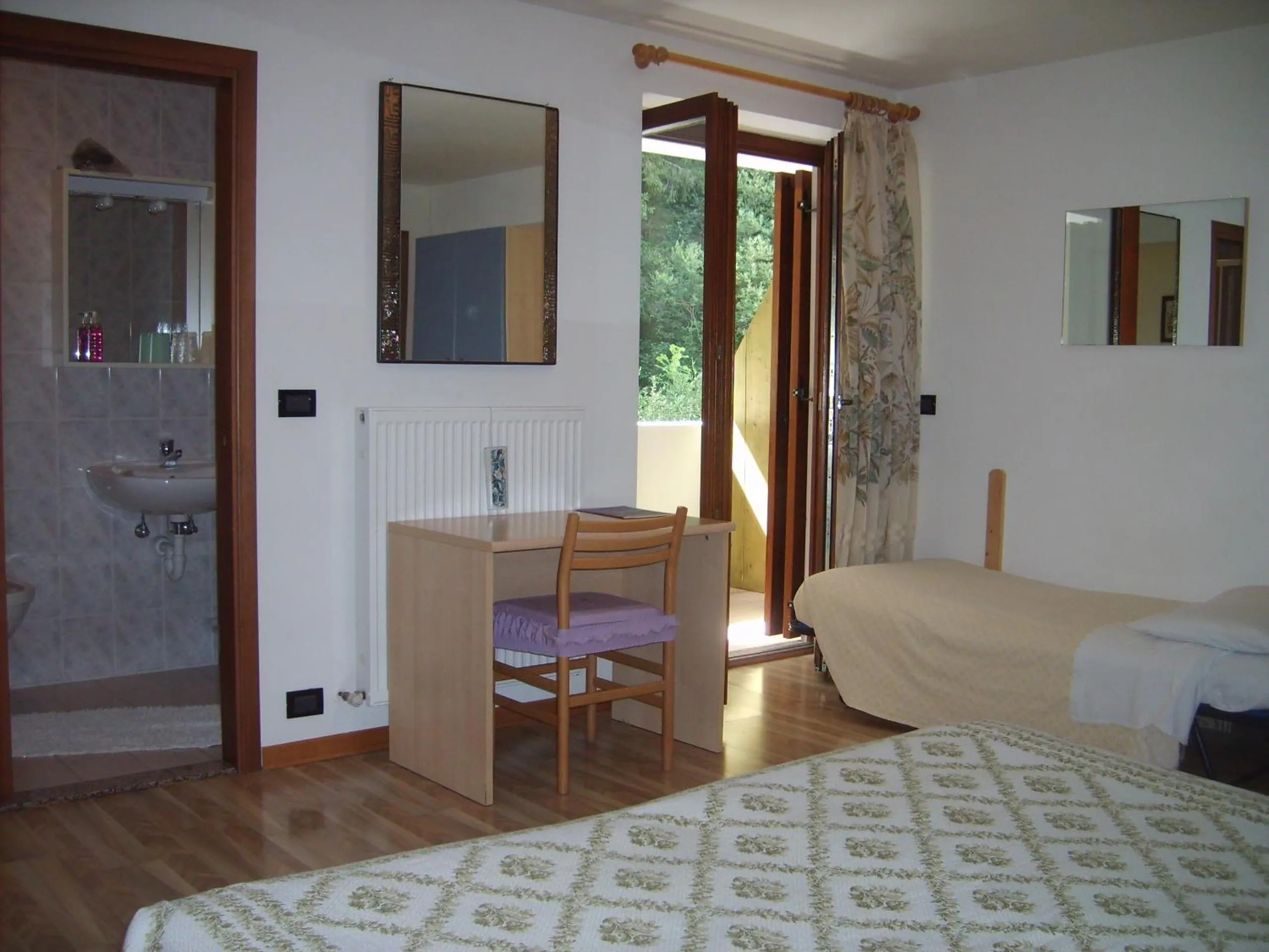 Bed in Hotel Genzianella