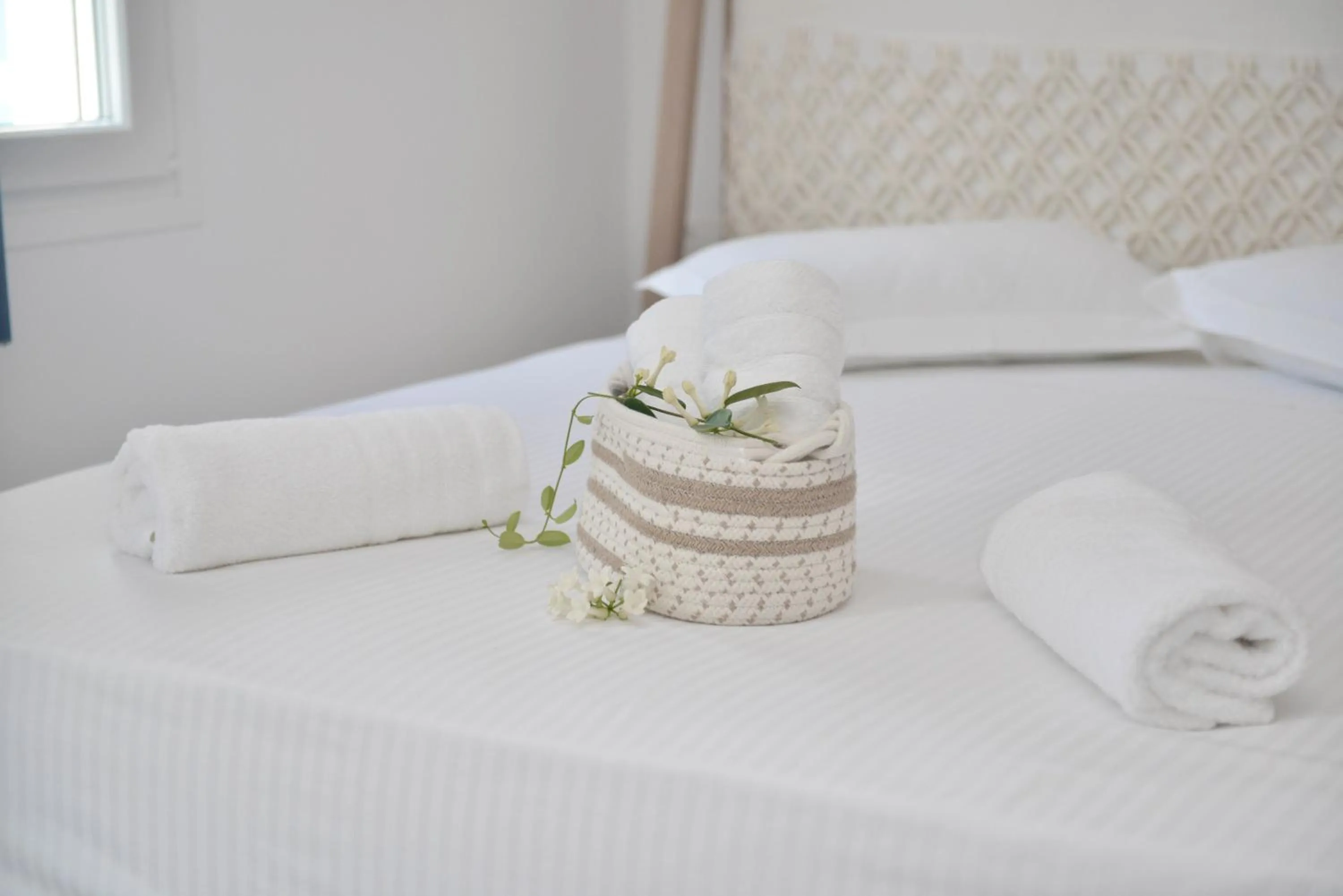 Bed in Blue Paradise Apartments