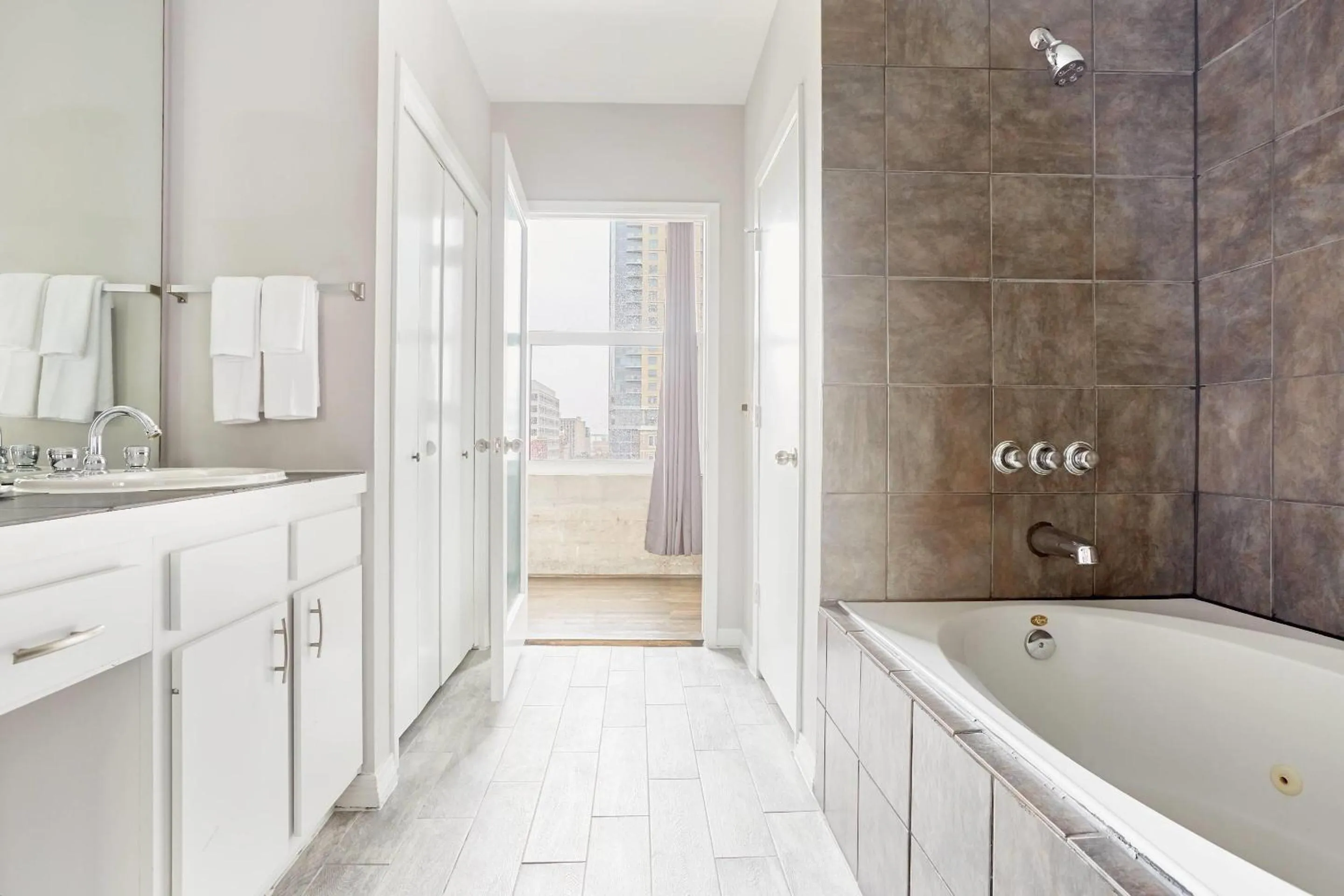 Bathroom in Reside Houston Downtown, a Wyndham Residence