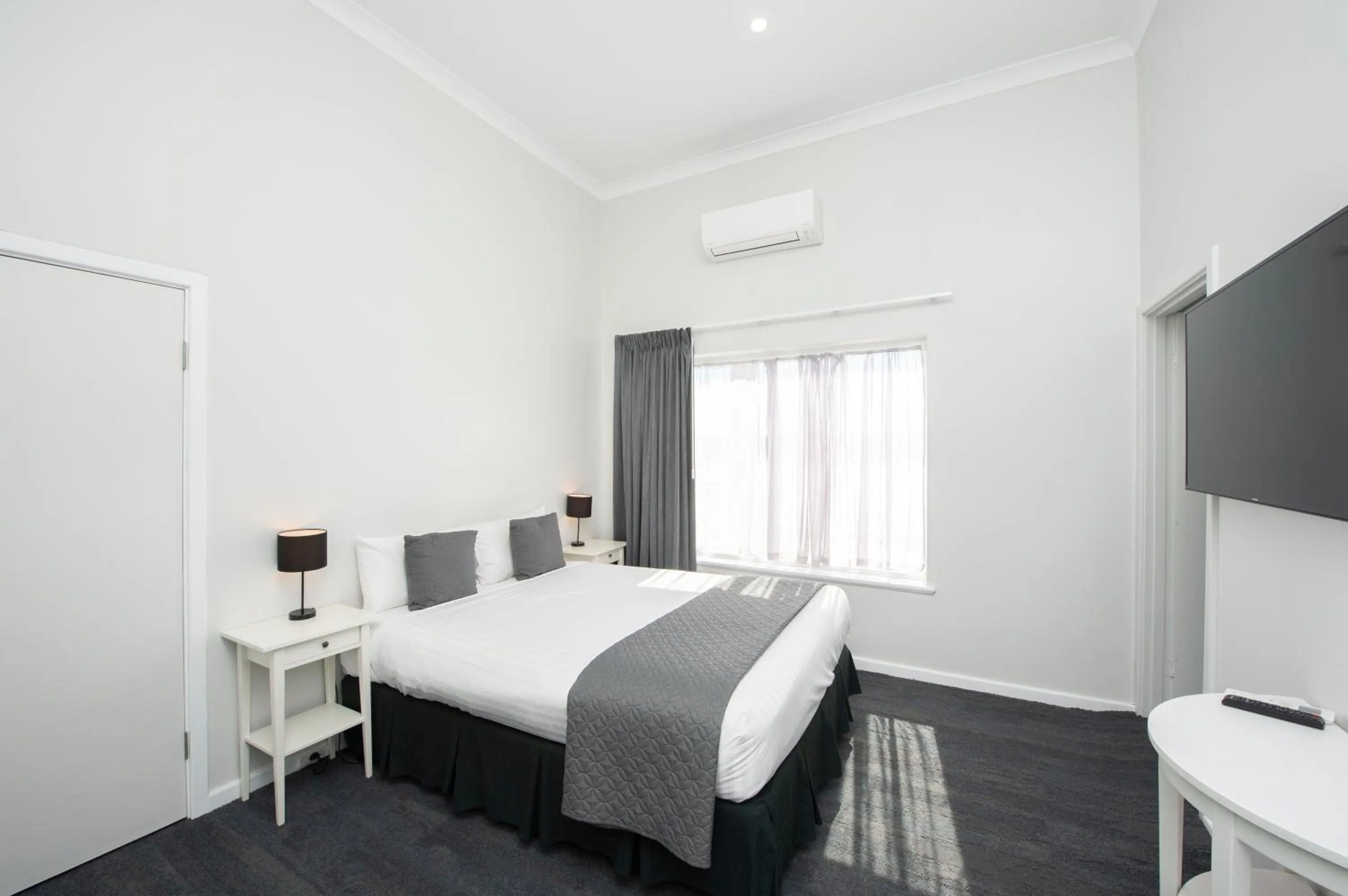 Bed in The Parade Hotel