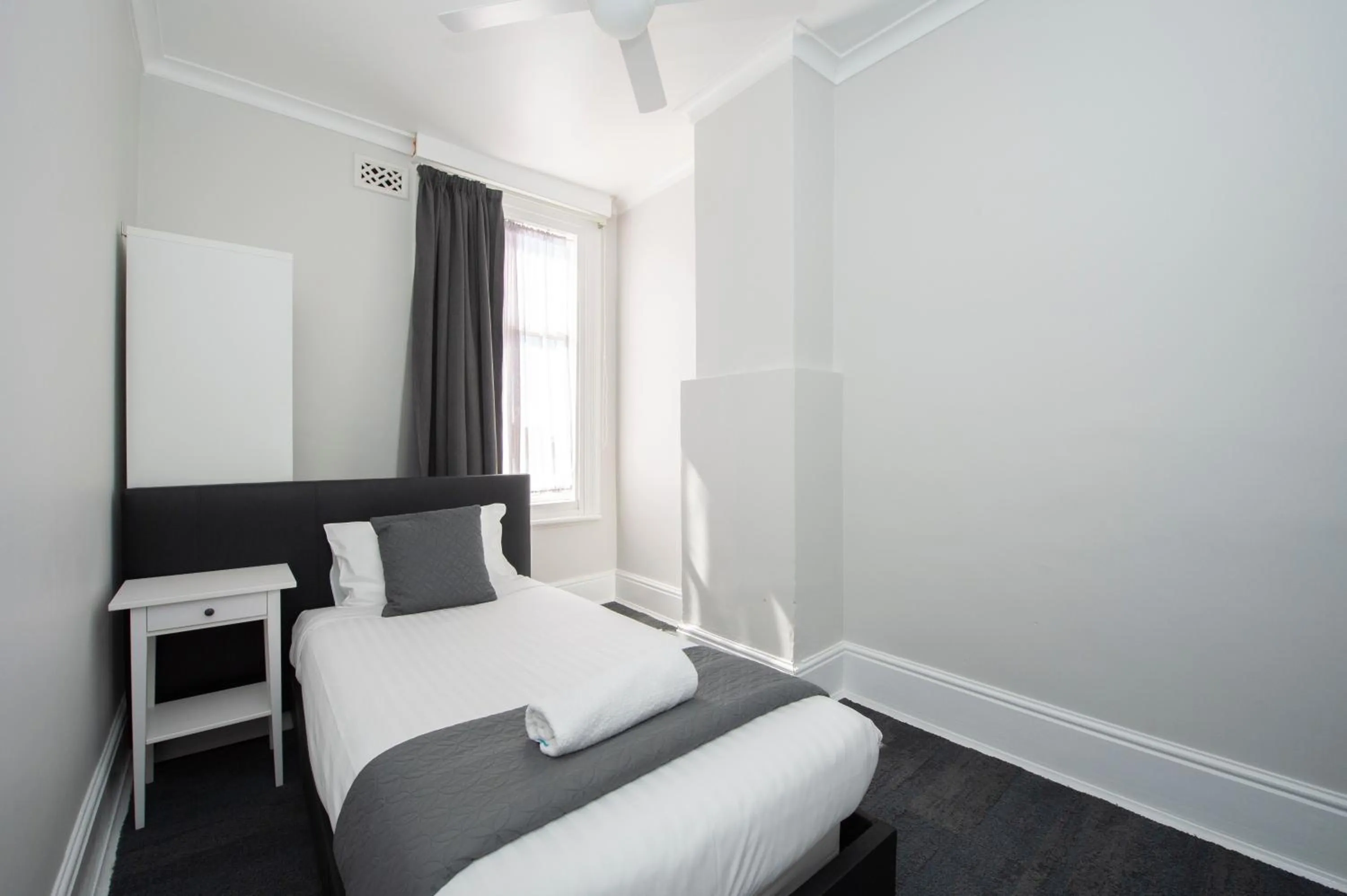 Bed in The Parade Hotel