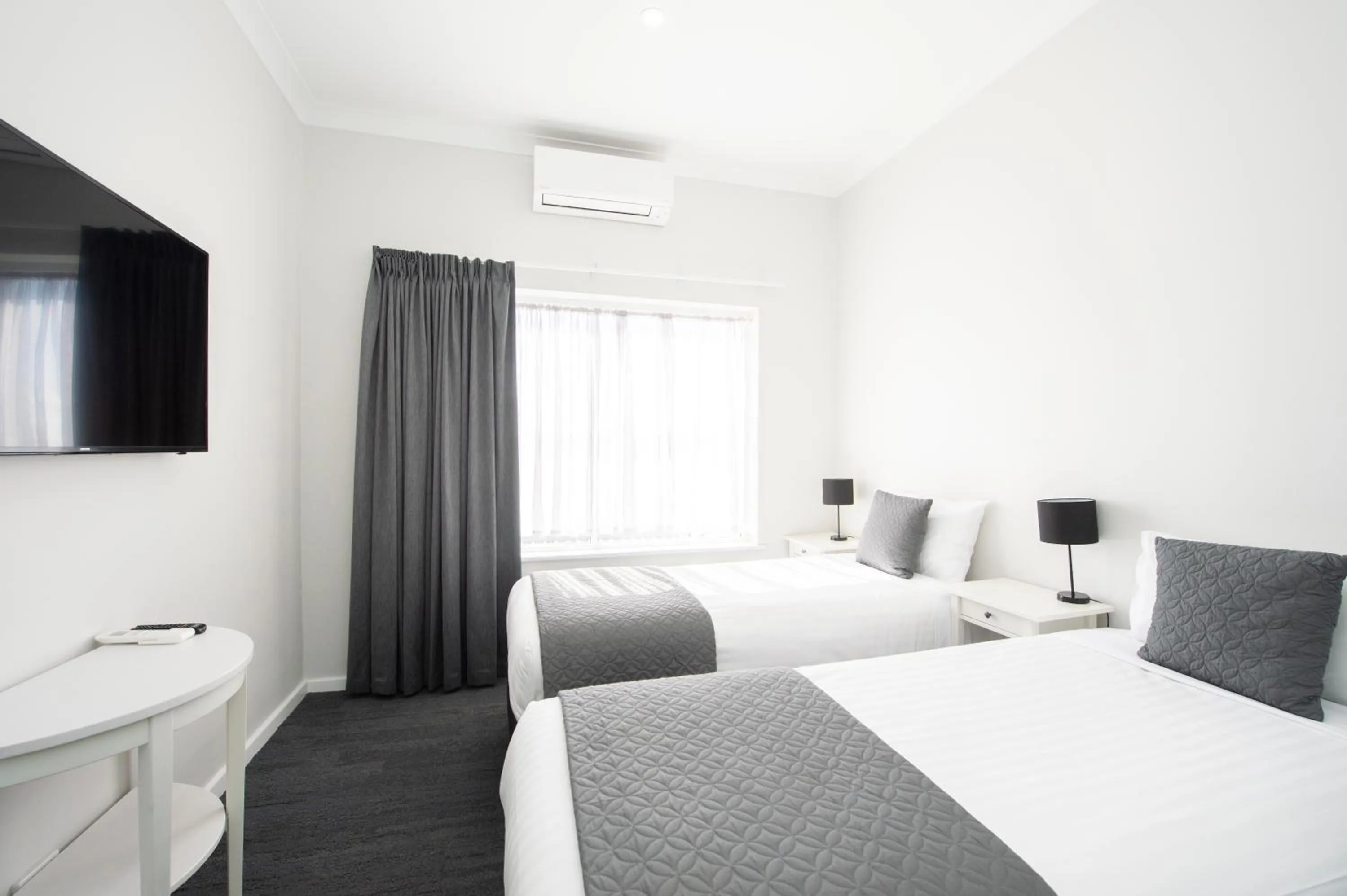 Bed in The Parade Hotel