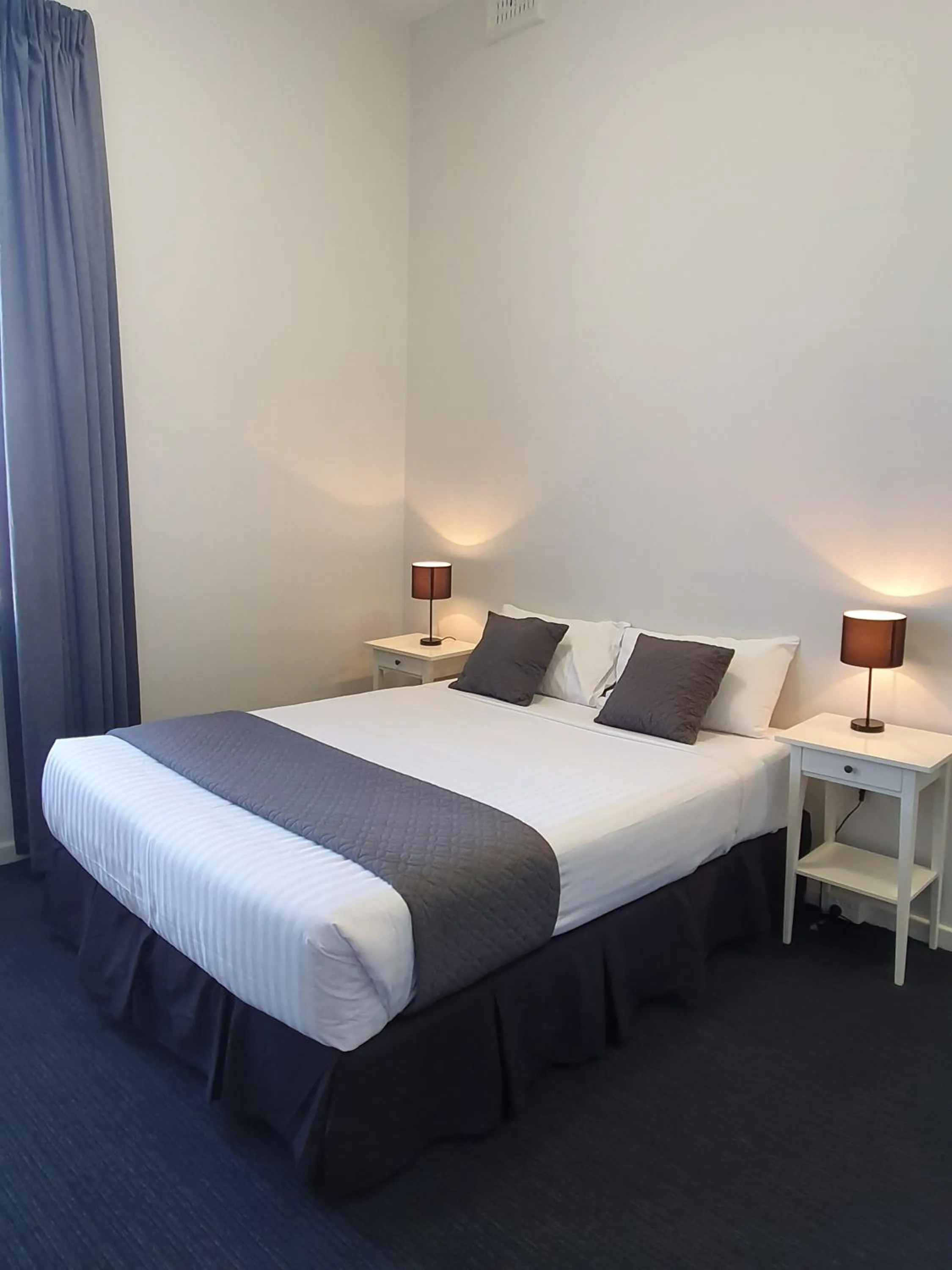 Bed in The Parade Hotel