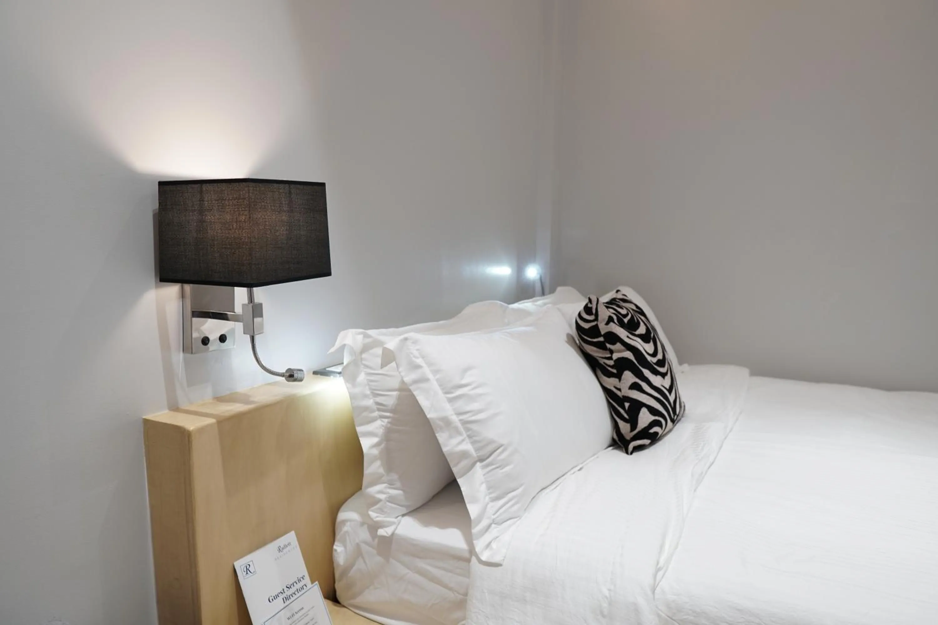 Communal lounge/ TV room, Bed in Radlett Residences Hotel - Tuguegarao