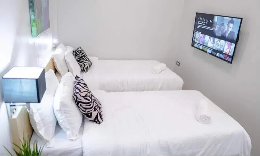Deluxe Twin Room in Radlett Residences Hotel - Tuguegarao Deluxe Twin Room in Radlett Residences Hotel - Tuguegarao