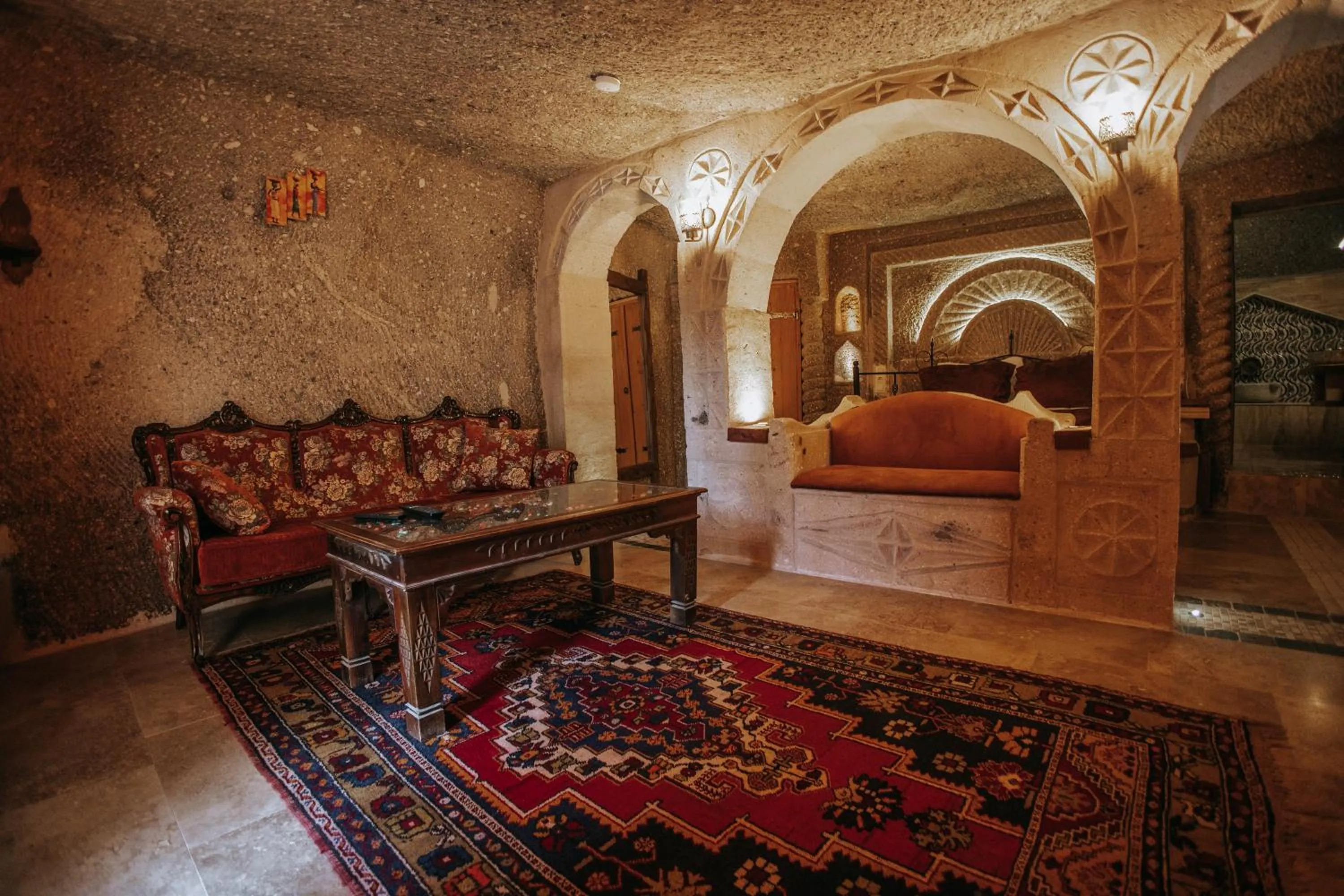 Seating area, Bed in Vintage Cave House Hotel