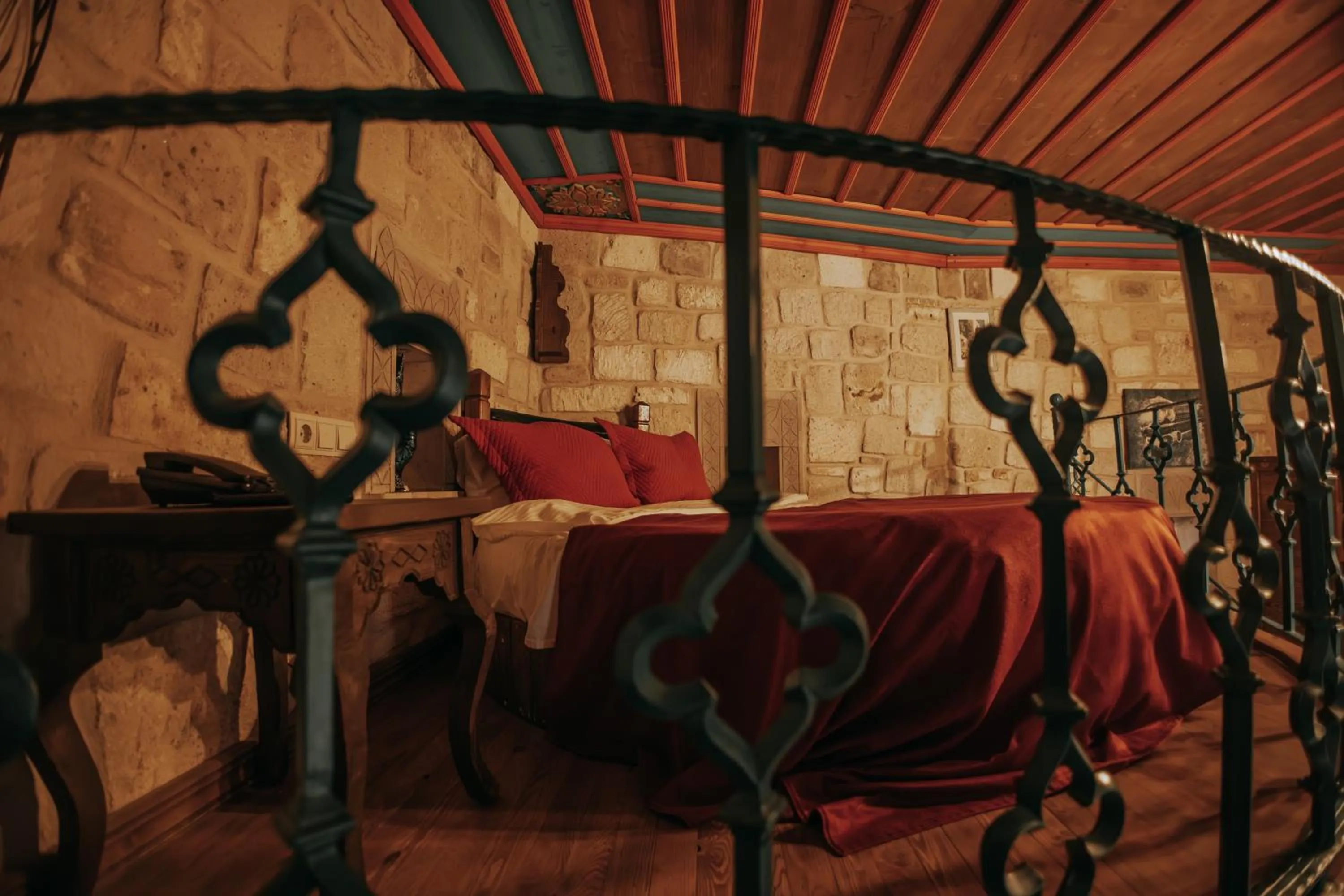 Bed in Vintage Cave House Hotel