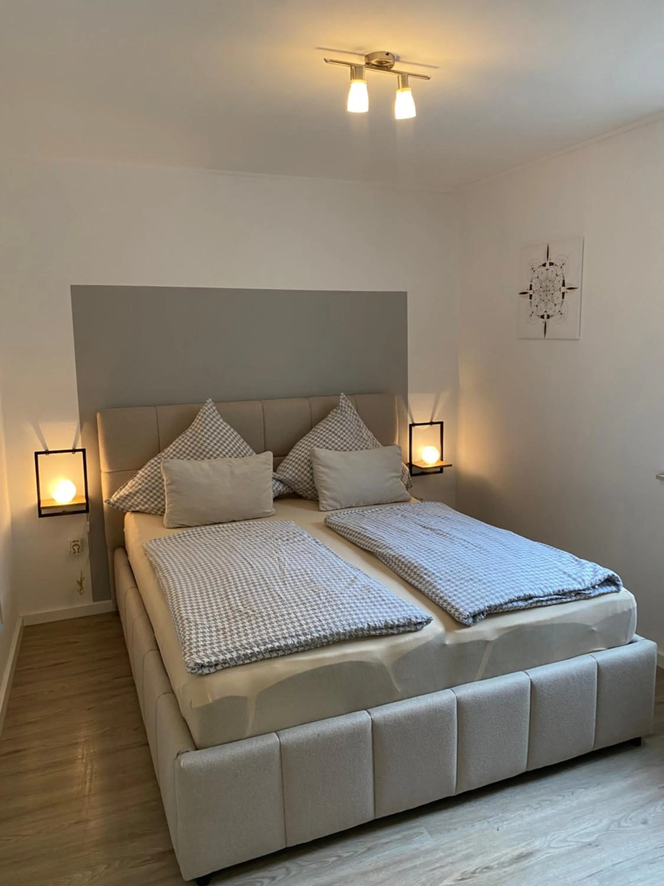 Bed in Ferienwohnung Ambiente