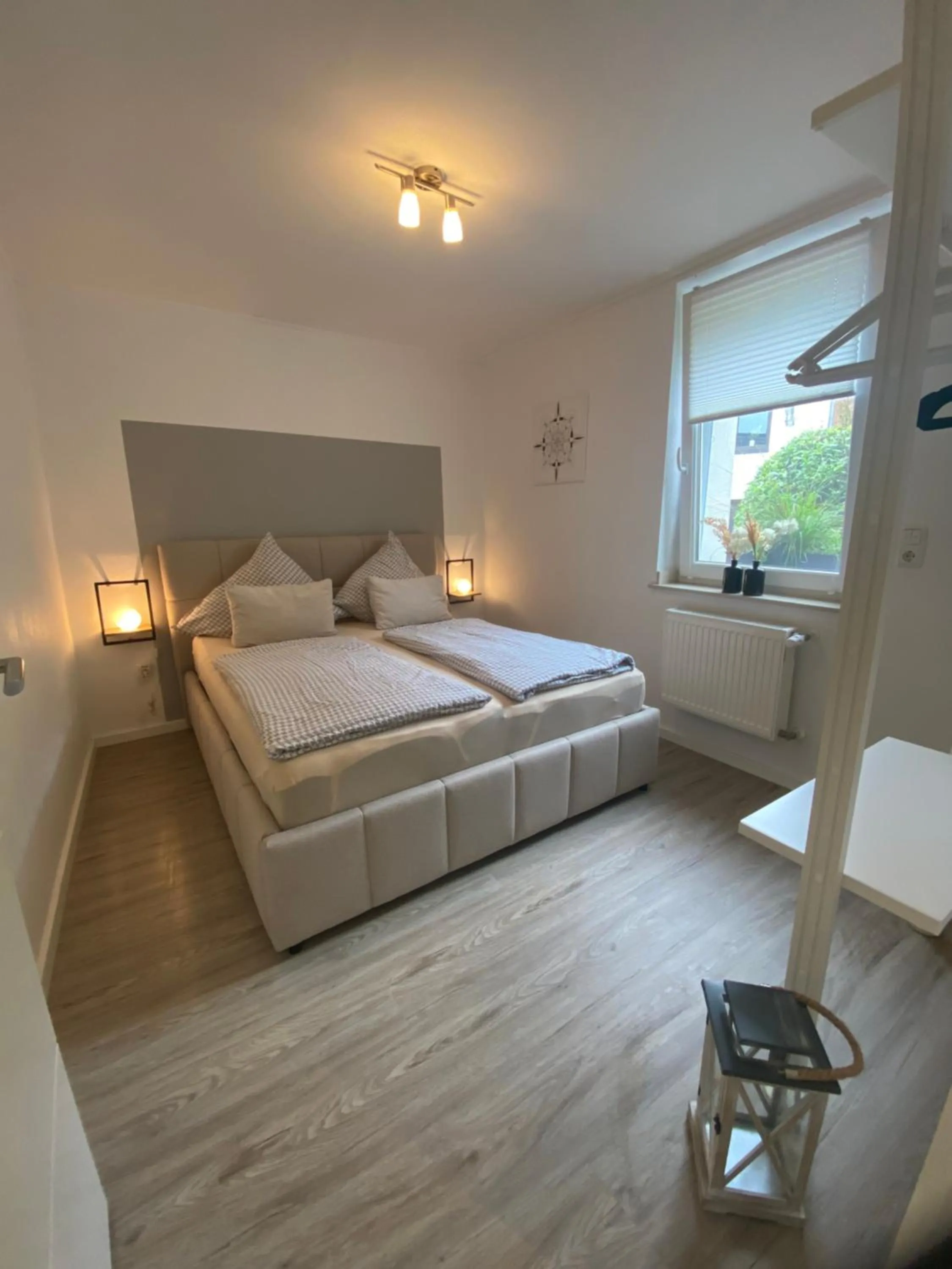 Bed in Ferienwohnung Ambiente