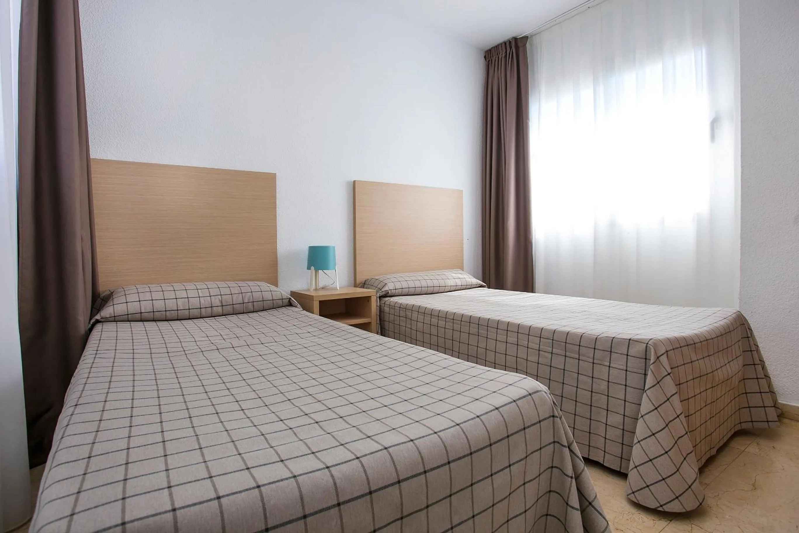 Bed in Apartamentos Buenos Aires By Mc