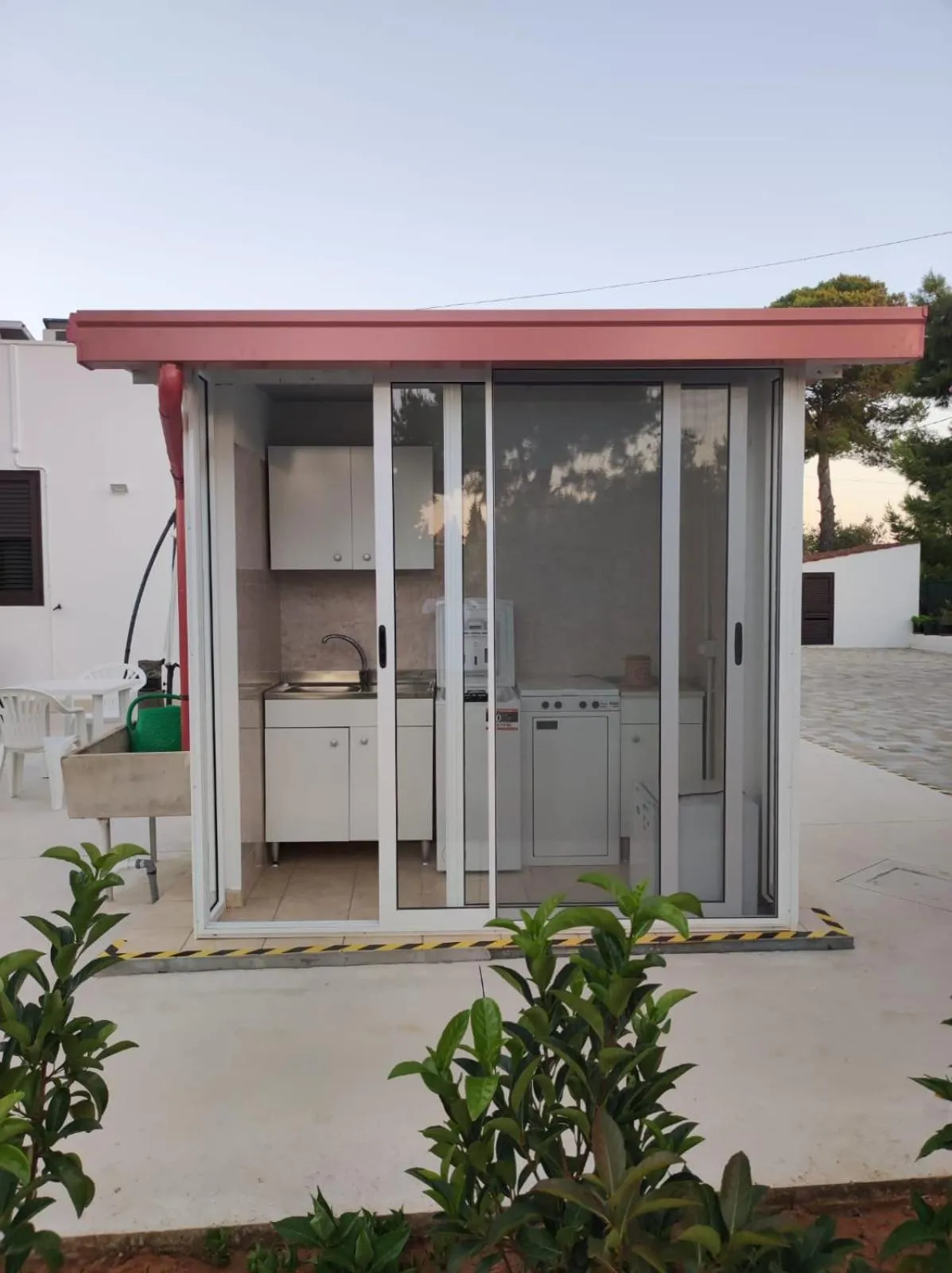 Communal kitchen in B&B Villa VITTORIO