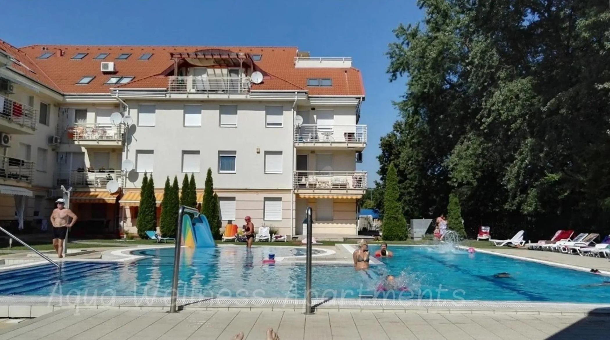 Swimming pool in Aqua Wellness Apartments