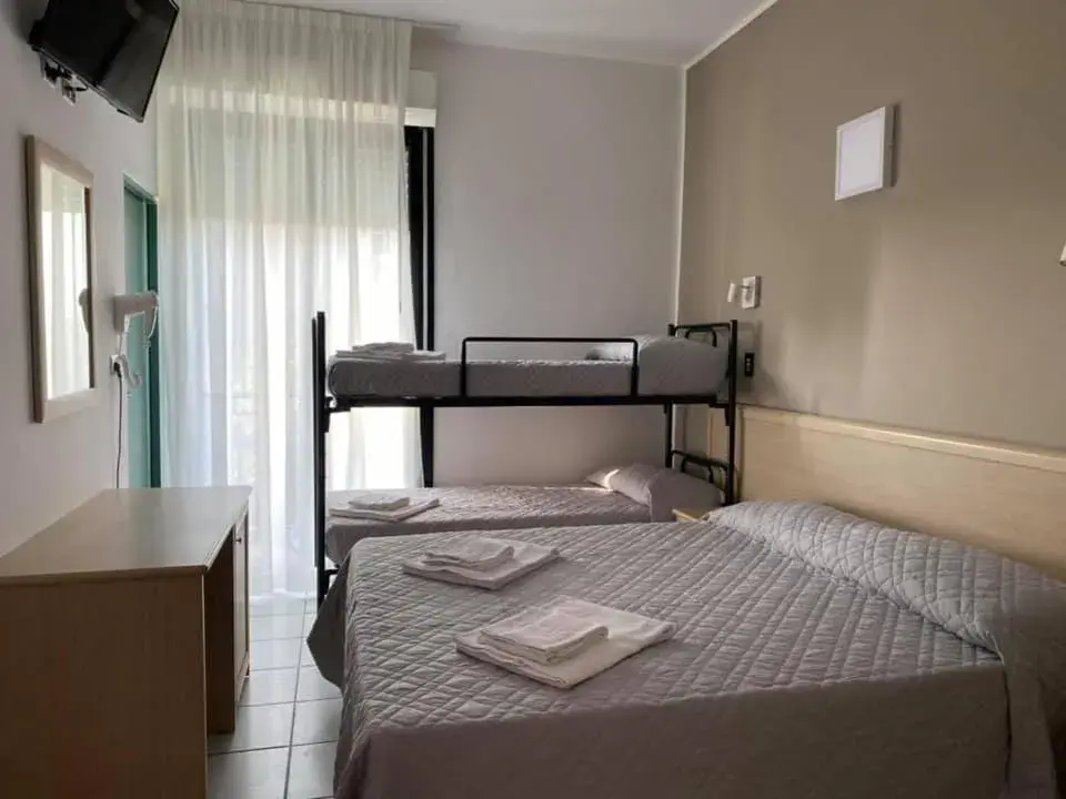 Triple Room in Hotel Rex Triple Room in Hotel Rex