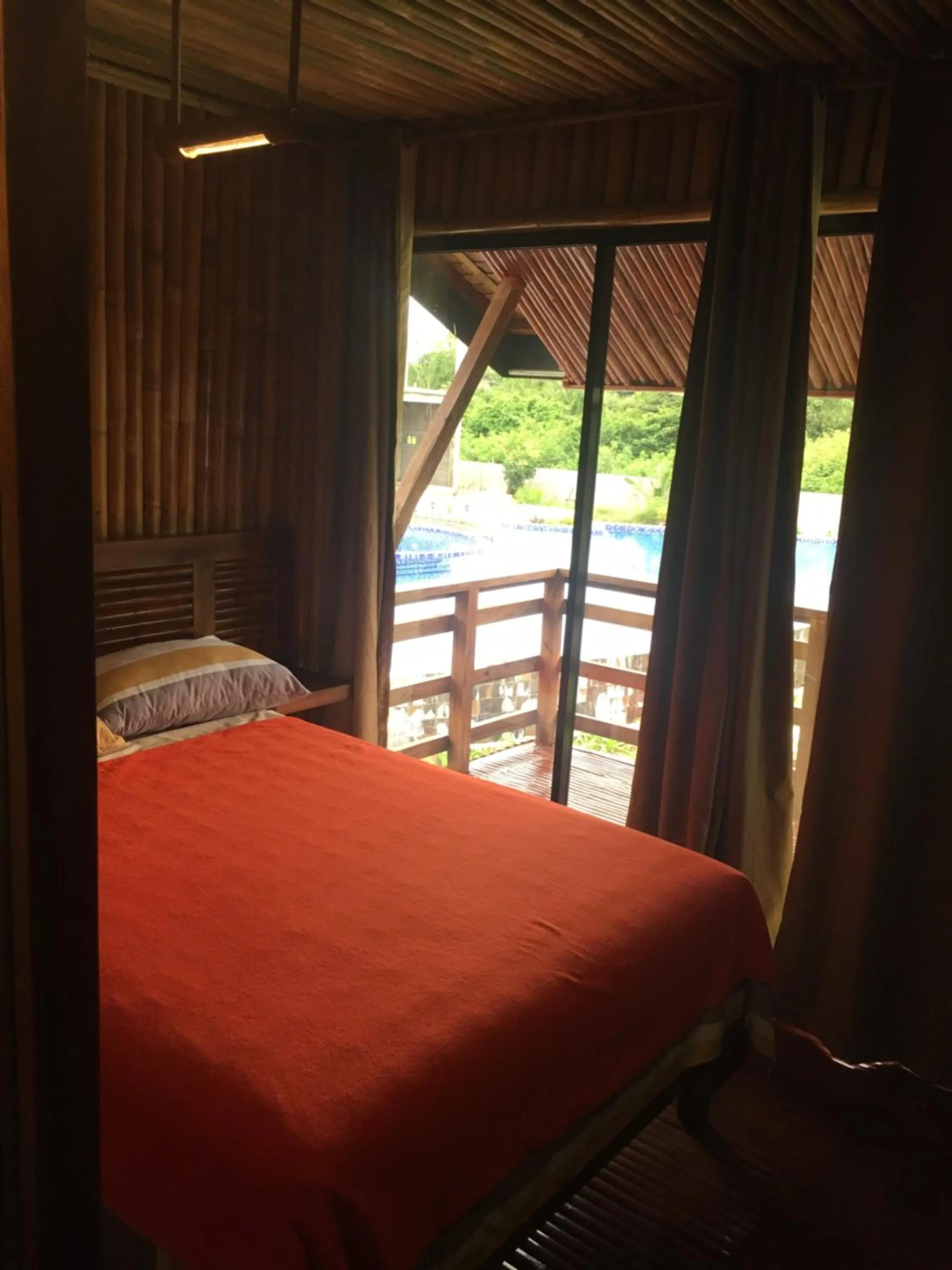 Balcony/Terrace, Bed in Vistapaloma beach resort