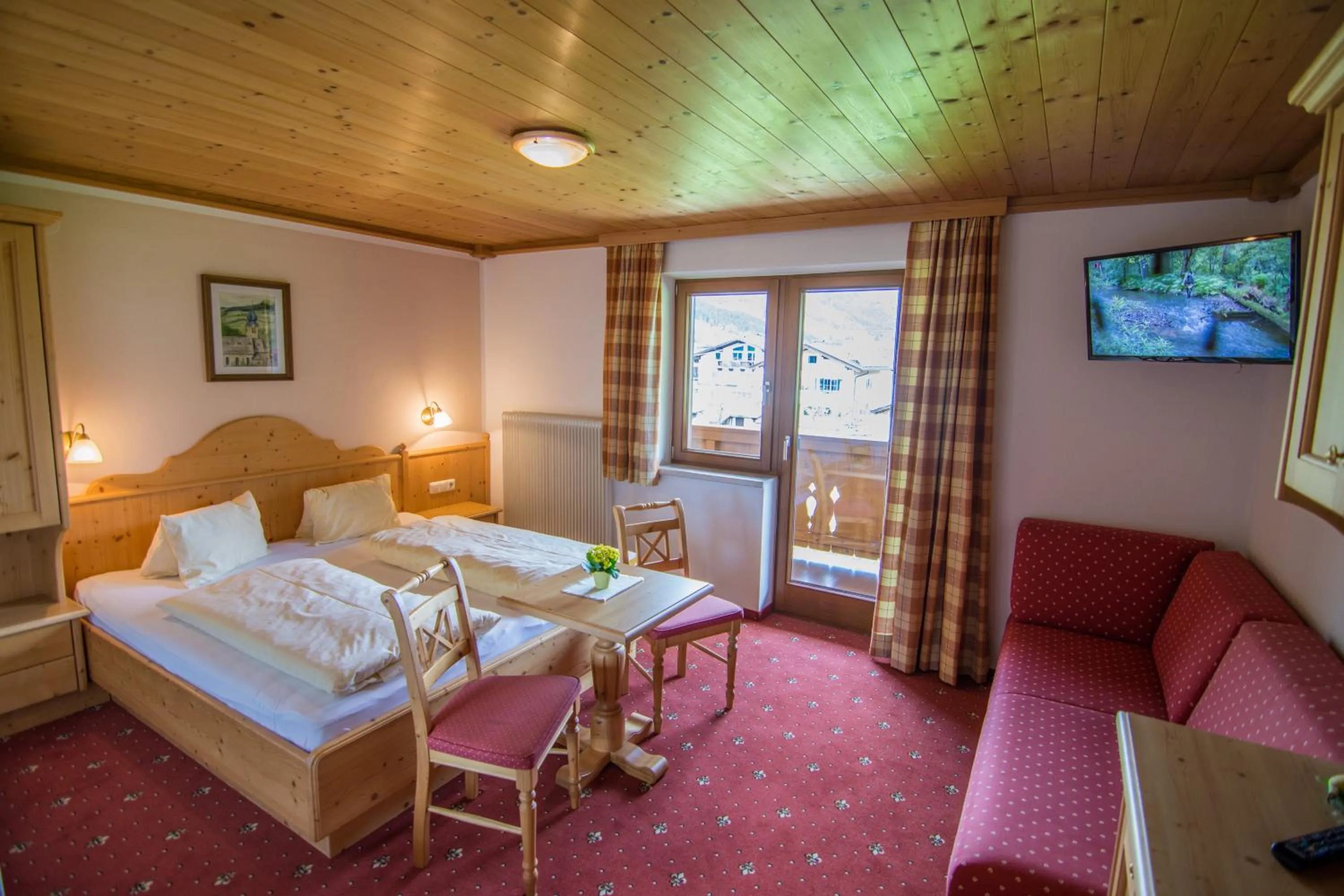 Seating area, Bed in Frühstückspension Samerhof