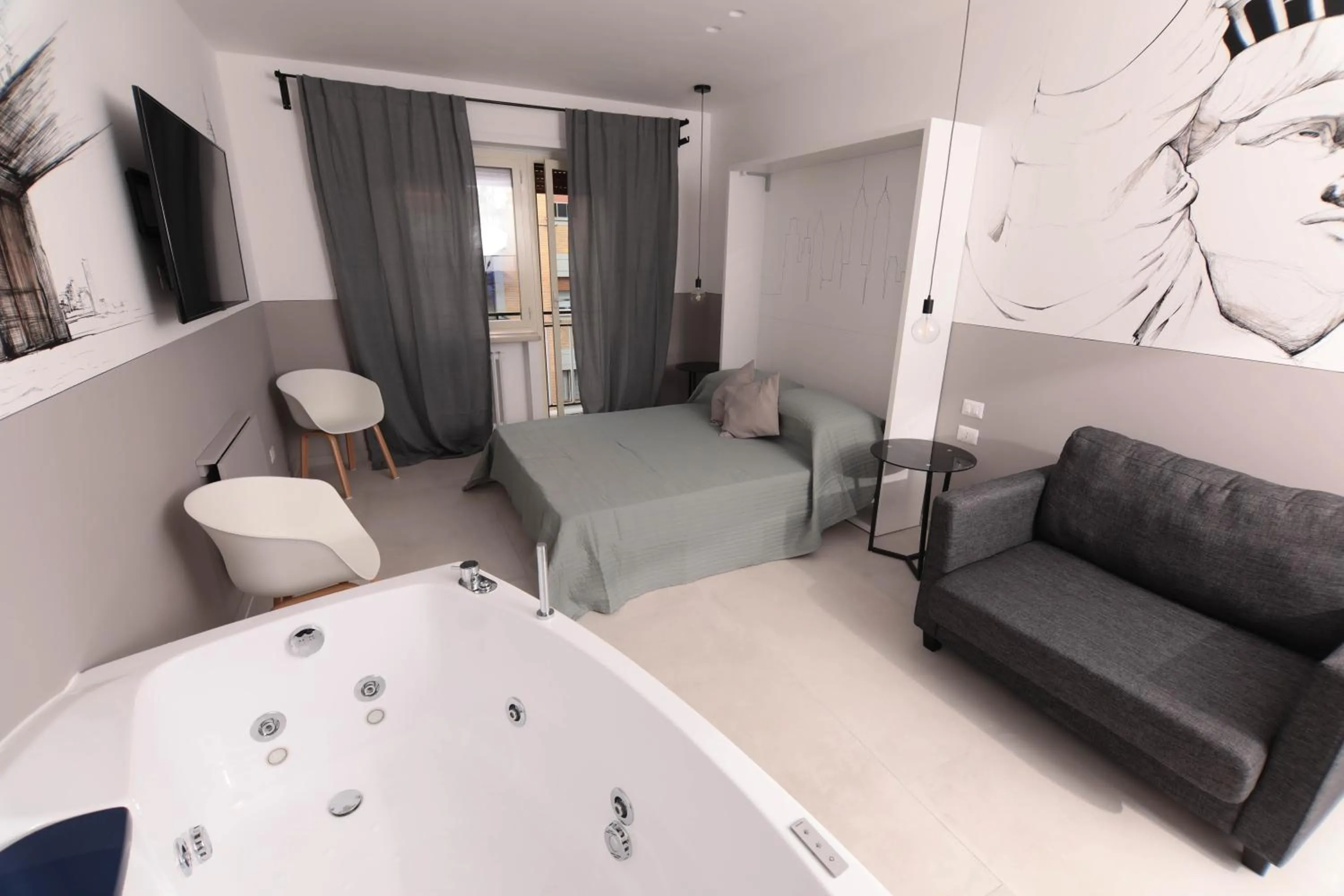 Photo of the whole room, Bed in O.Effe. Suites / Vatican