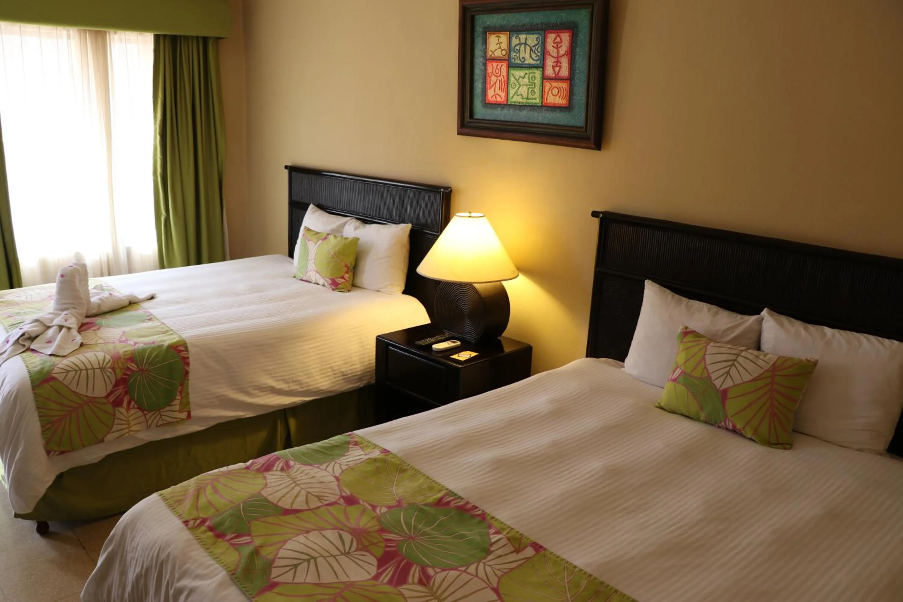 Bed in Coco Beach Hotel