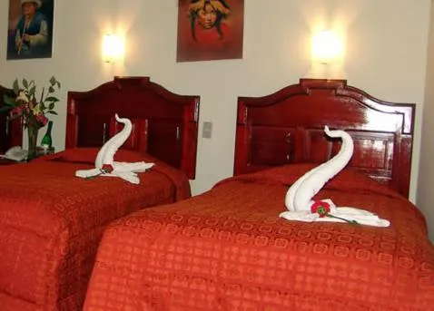 Bed in Hotel Inkayra