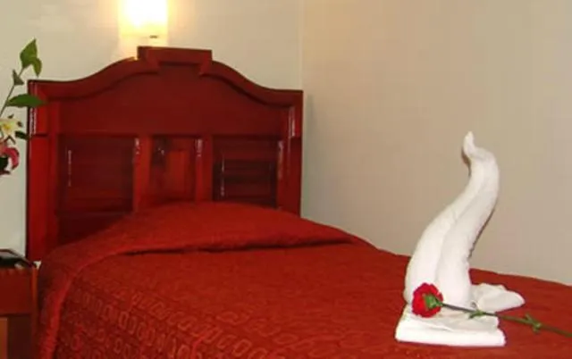 Bed in Hotel Inkayra
