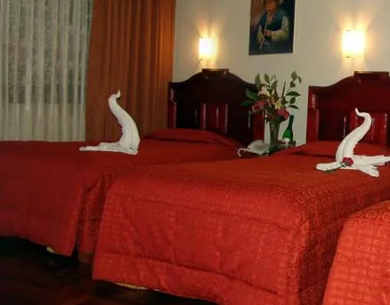 Bed in Hotel Inkayra
